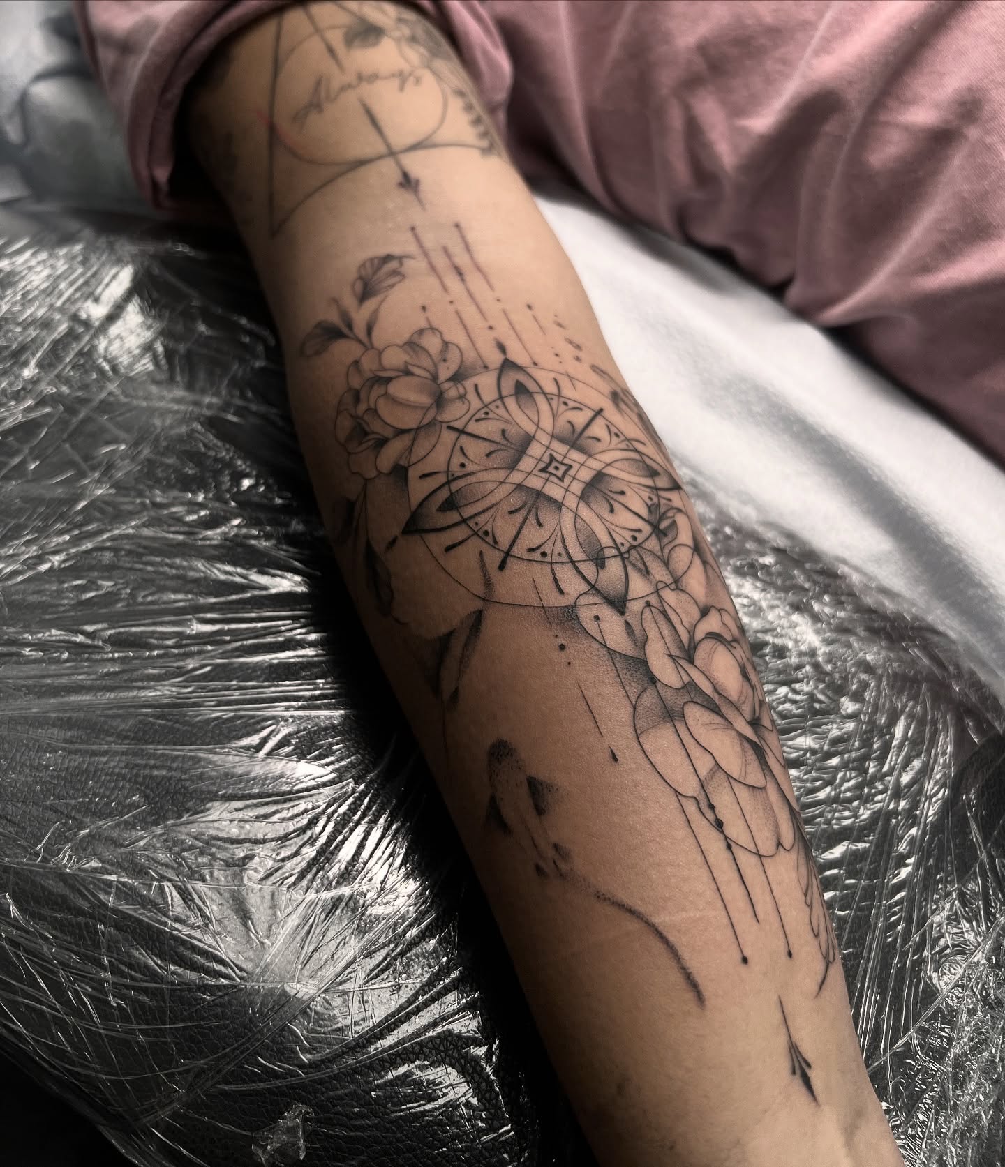 Geometric mandala geometric tattoo on the forearm by Chloe
