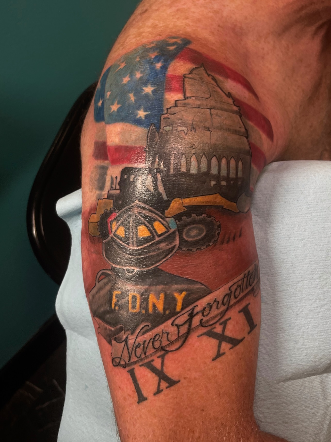 9/11 memorial American traditional tattoo on the upper arm by ๐ต๐๐๐ ๐ฐ๐๐๐
