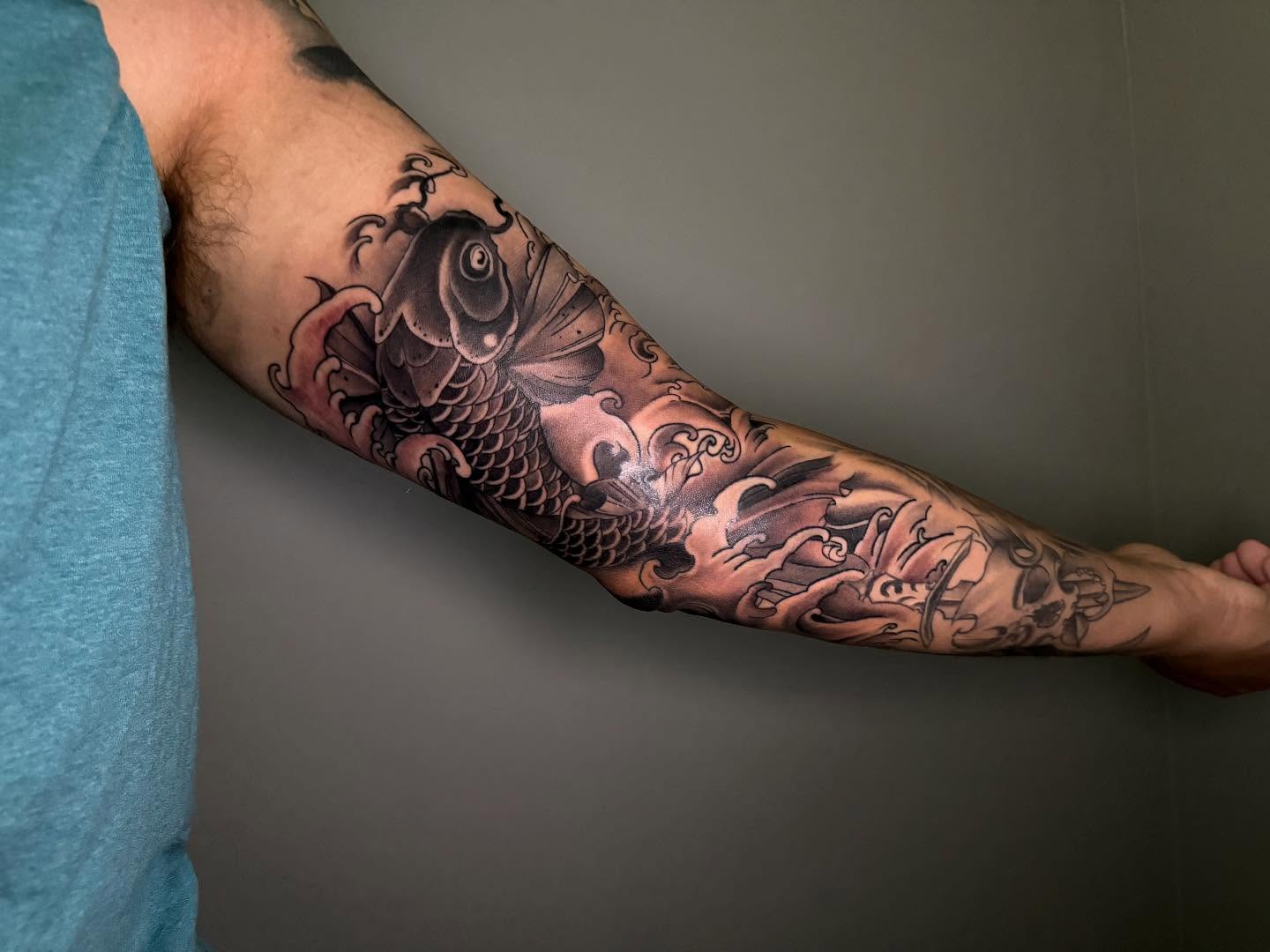 Koi fish japanese irezumi tattoo on the forearm by Diana Guillette
