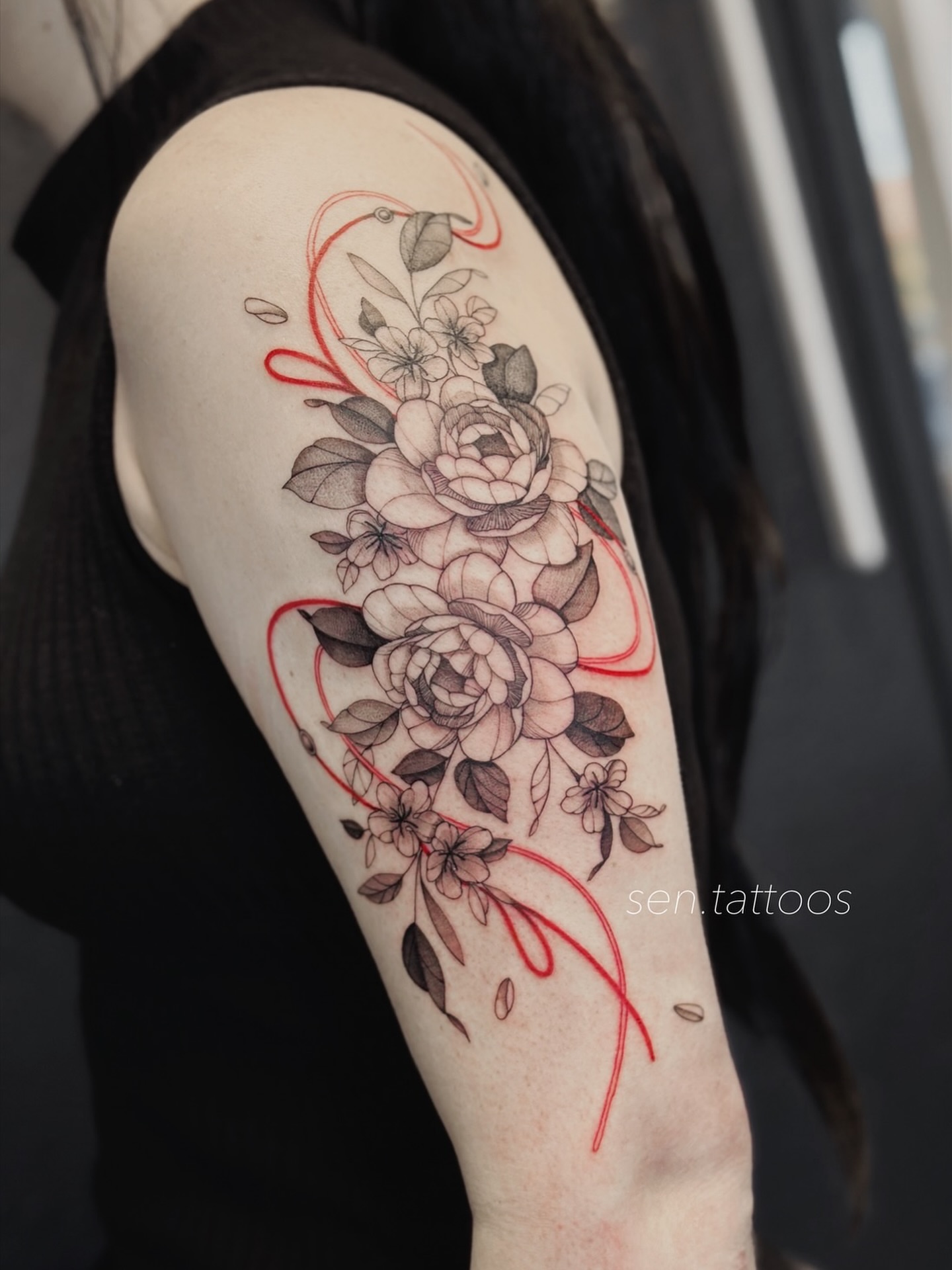 Floral bouquet realism tattoo on the forearm by Sen Tattooer