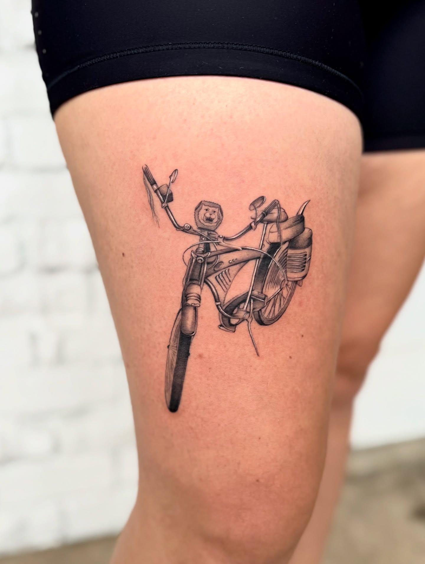 Motorcycle black and grey tattoo on the thigh by Lily Cuoio~ Seattle