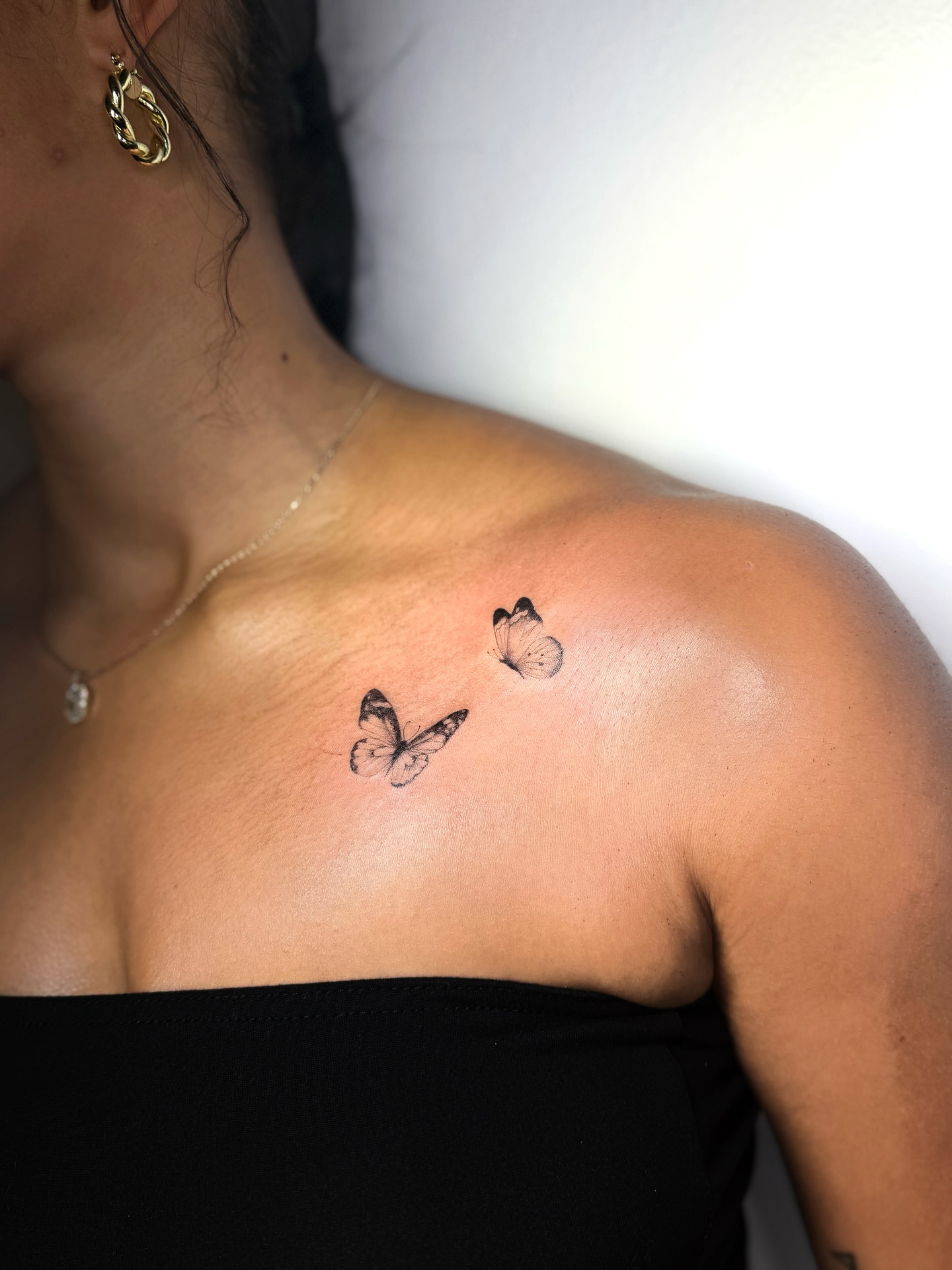 Butterflies black and grey tattoo on the shoulder by ꜰɪɴᴇ ʟɪɴᴇ ᴛᴀᴛᴛᴏᴏꜱ