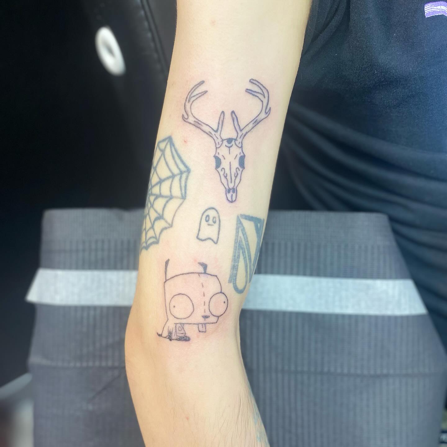 Deer skull and ghost dotwork tattoo on the forearm by MD Ariel🦷