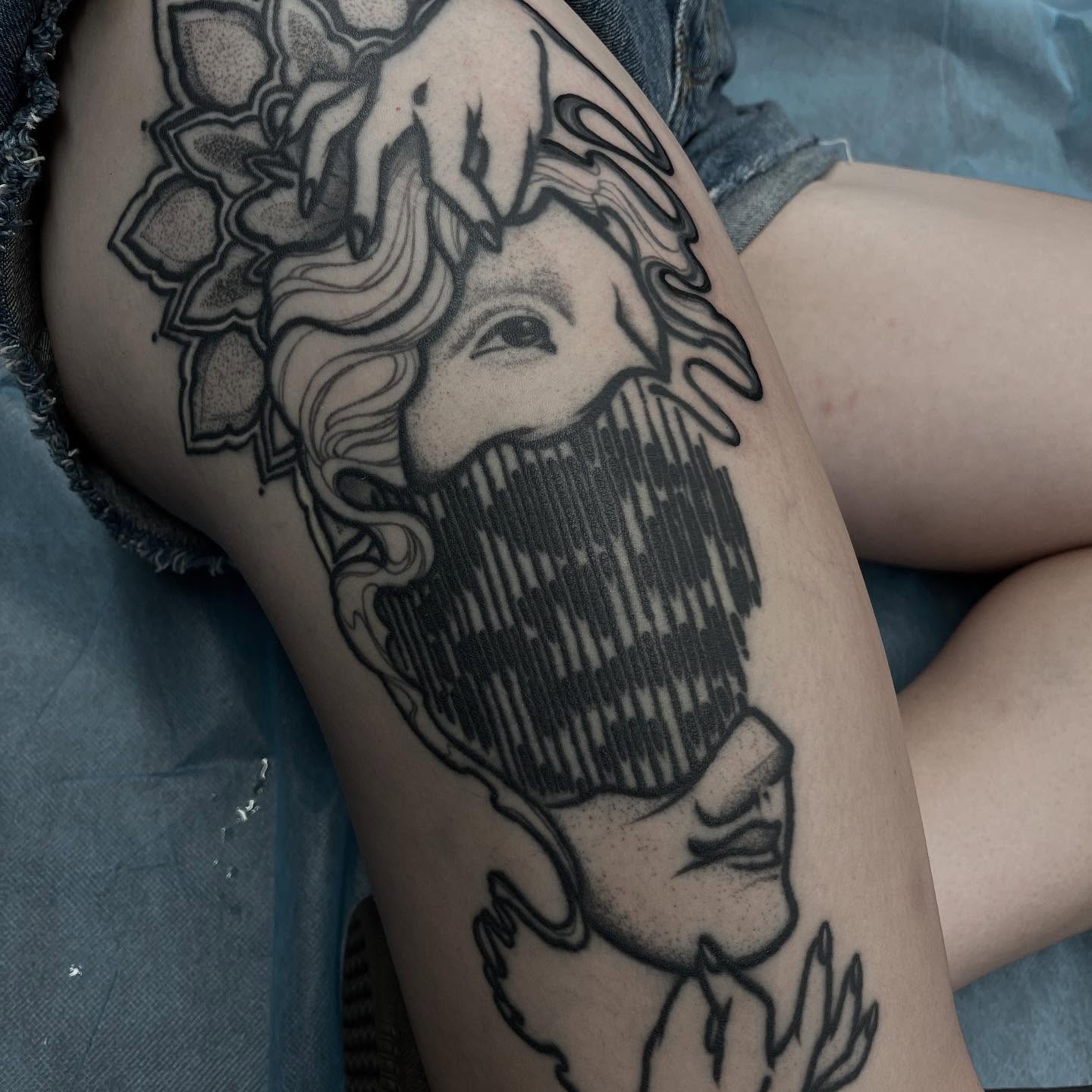 Bearded man with floral crown black and grey tattoo on the thigh by Brandon Mola, Chicago, Illinois