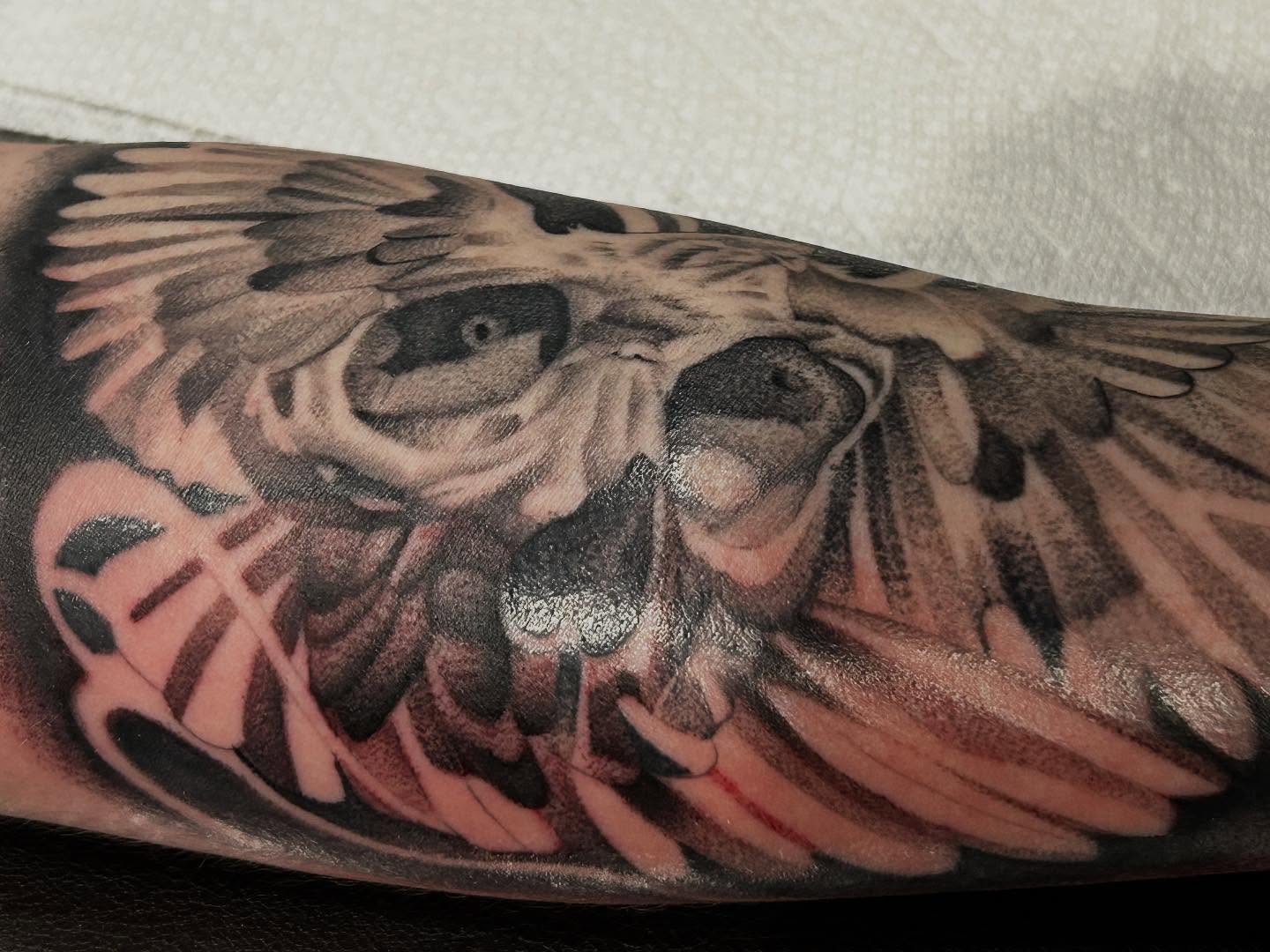 Owl realism tattoo on the forearm by Brian Keith
