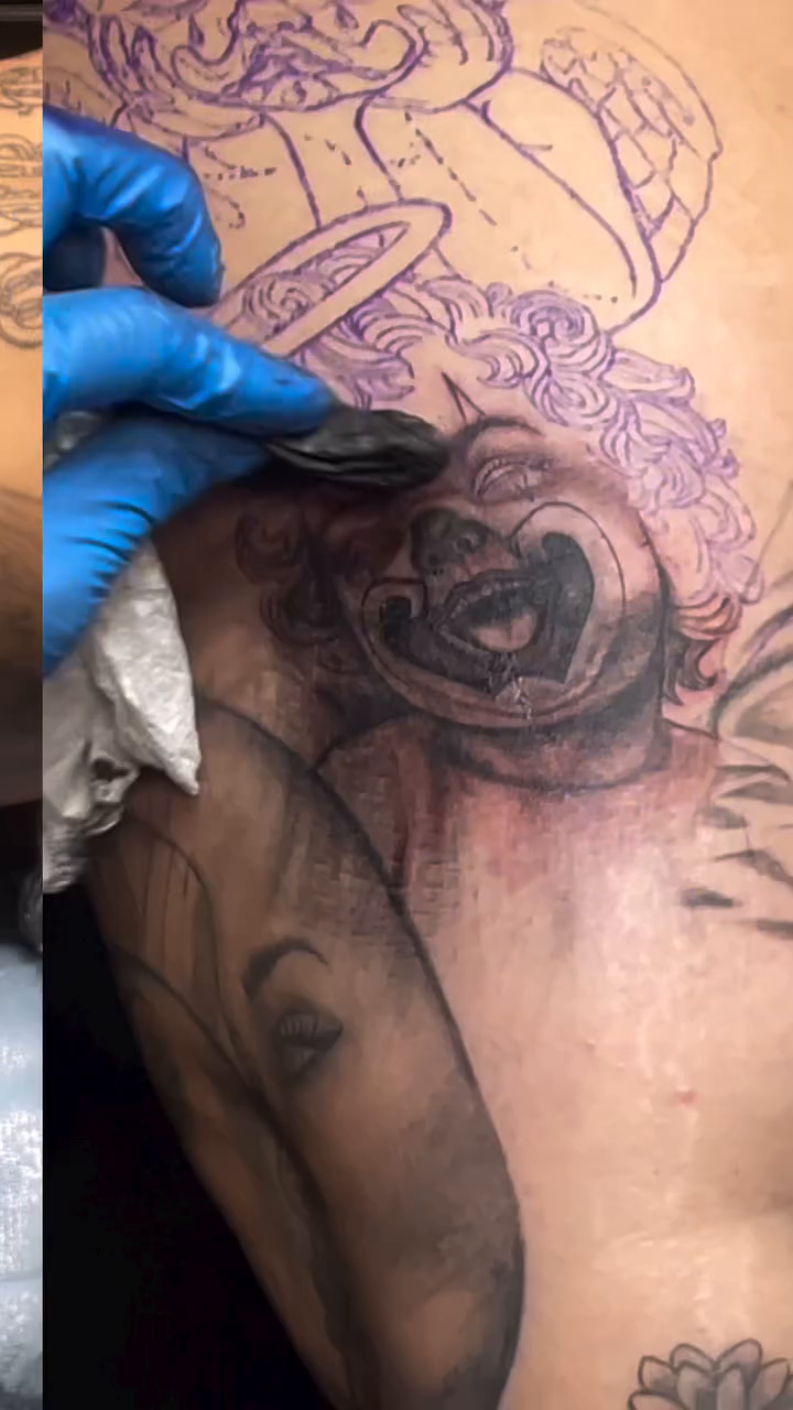 Rose and face tattoo realism tattoo on the shoulder by Teddi James, Renton, Washington