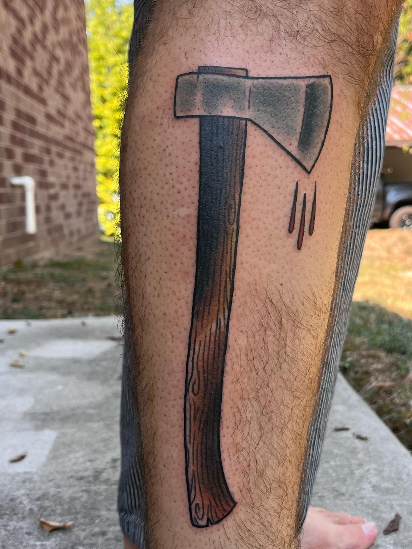 Axe black and grey tattoo on the leg by TYP 419, Toledo, Ohio