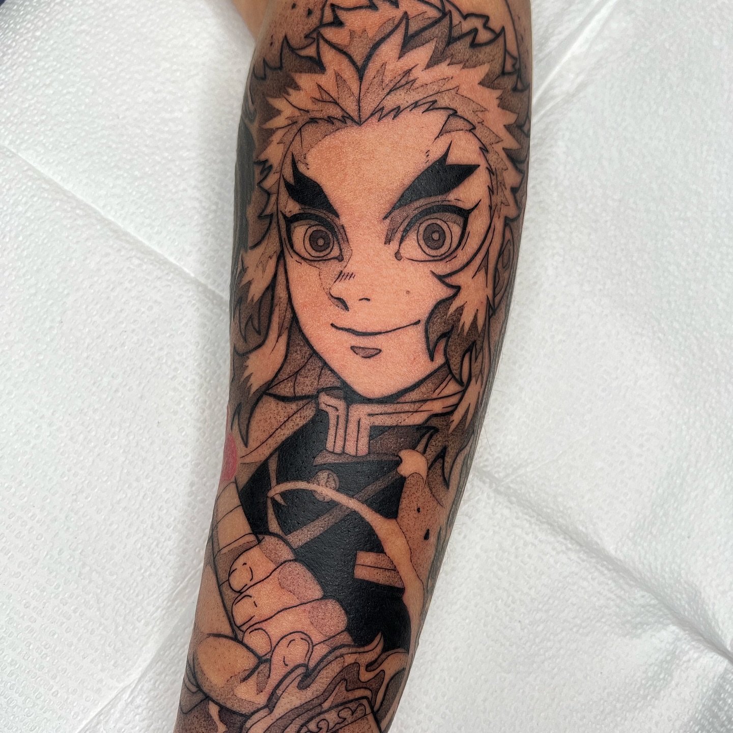 Anime character anime tattoo on the forearm by Z, Greenville, South Carolina