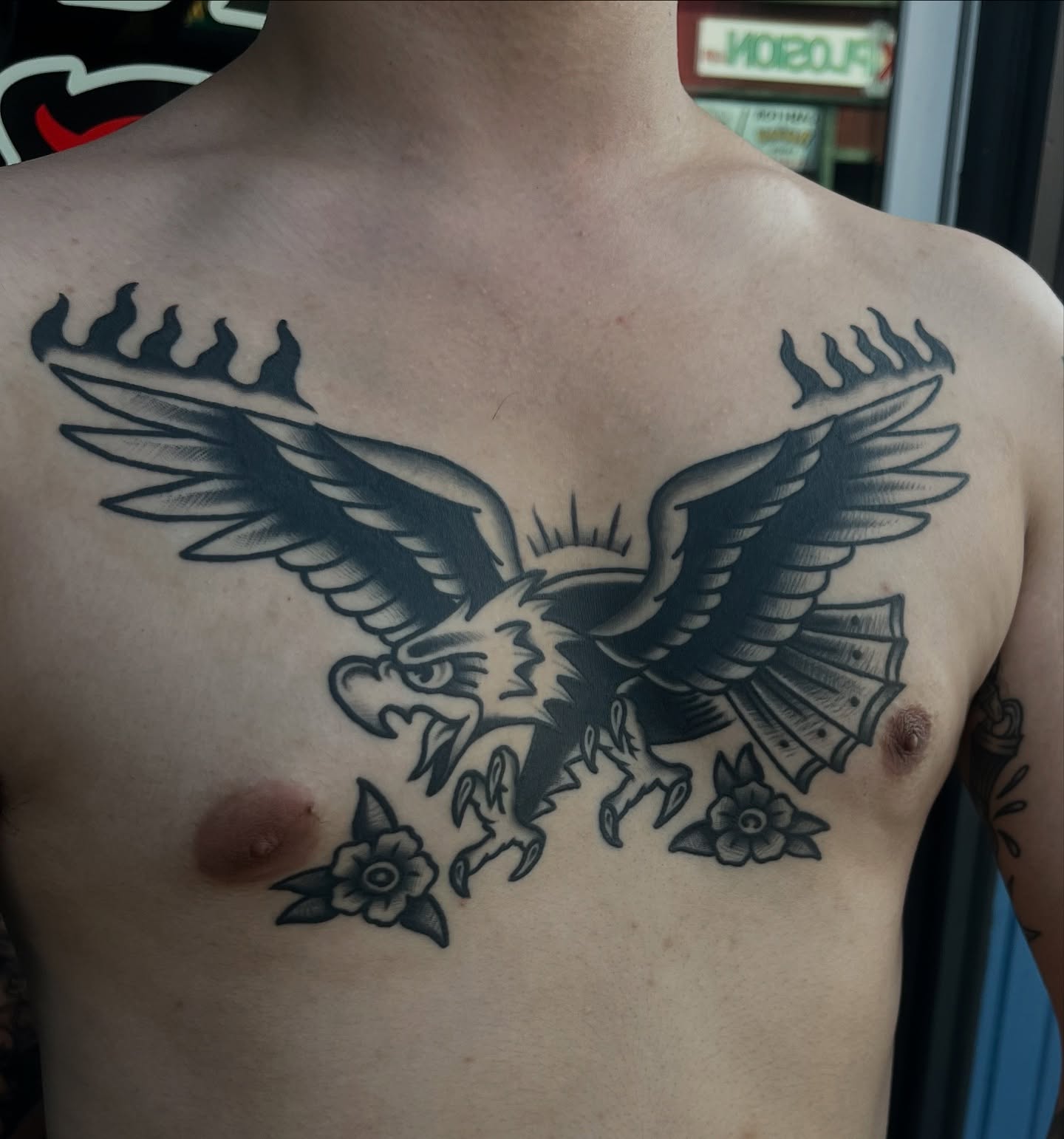 Eagle American traditional tattoo on the chest by August B., Renton, Washington