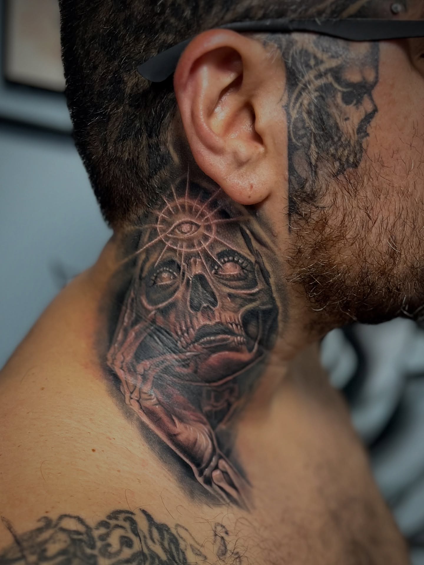 Skull realism tattoo on the neck by Yulia Chekir, Chicago, Illinois