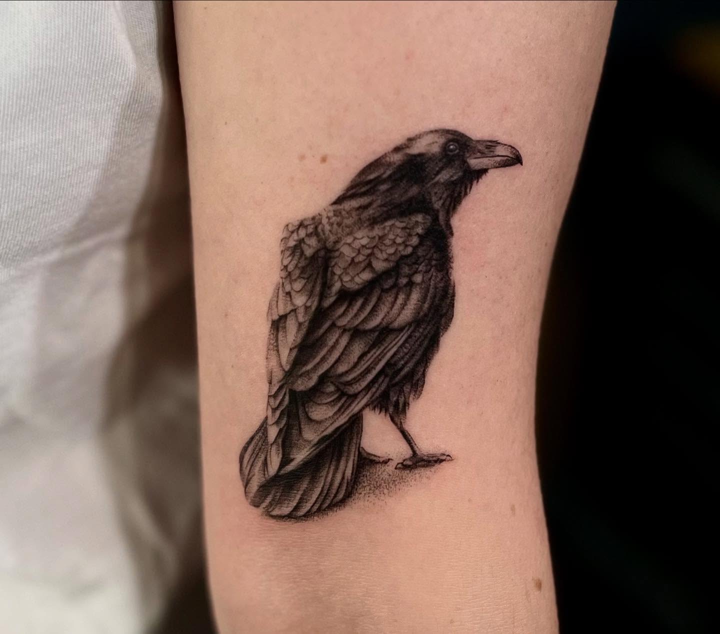 Crow dotwork tattoo on the forearm by Lee Ranco