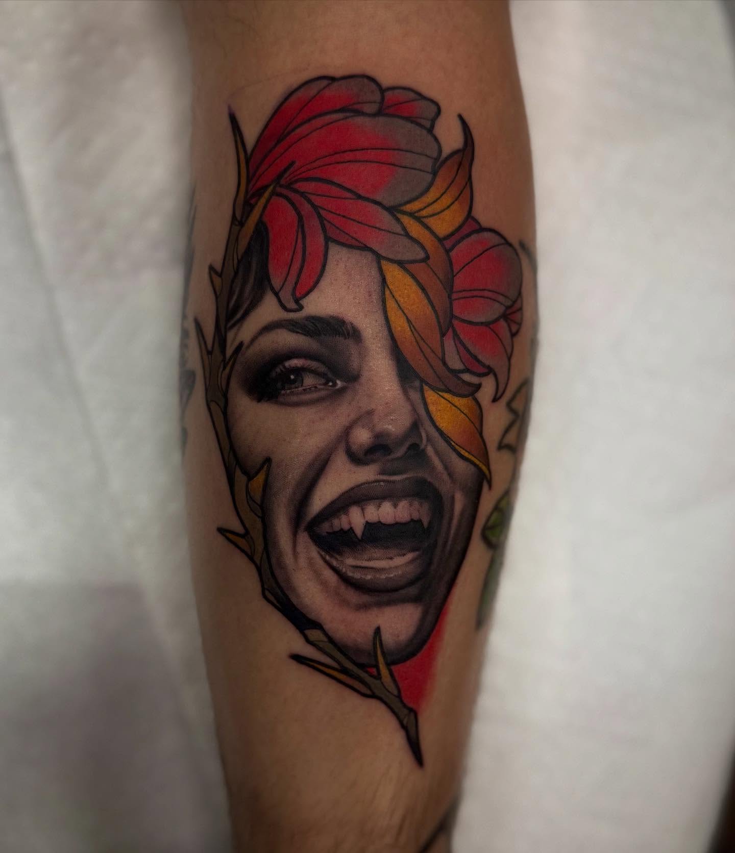 Woman with flower crown realism tattoo on the forearm by Sam Babcock