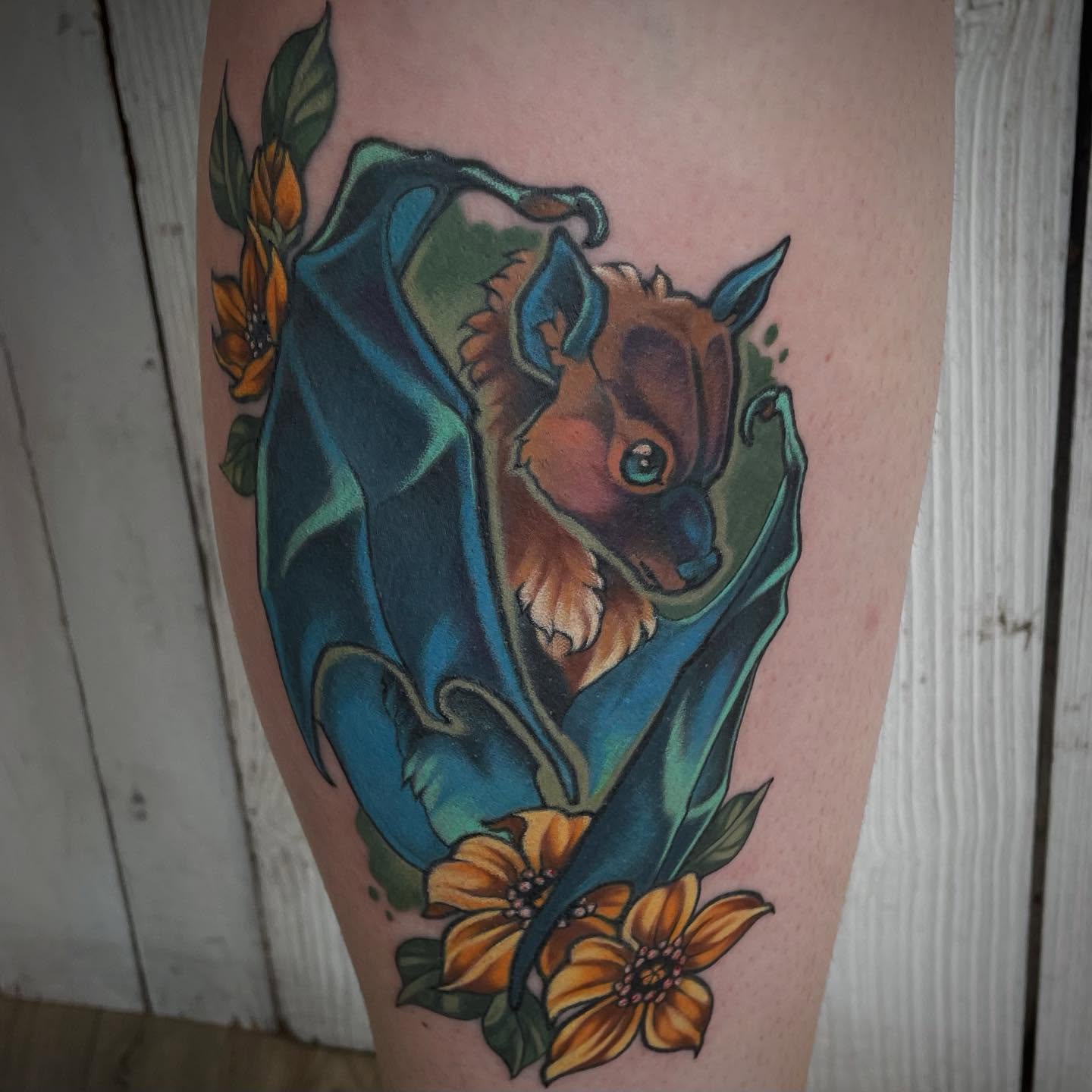 Bat and flowers American traditional tattoo on the forearm by Brianna, Portland, Oregon
