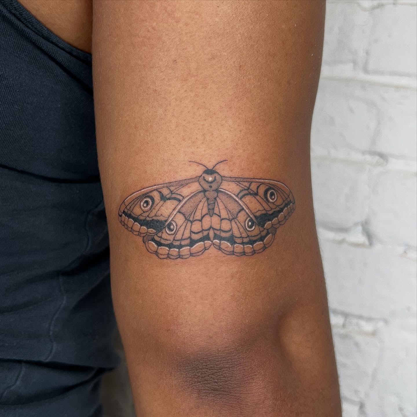 Butterfly realism tattoo on the forearm by Robb Wilson