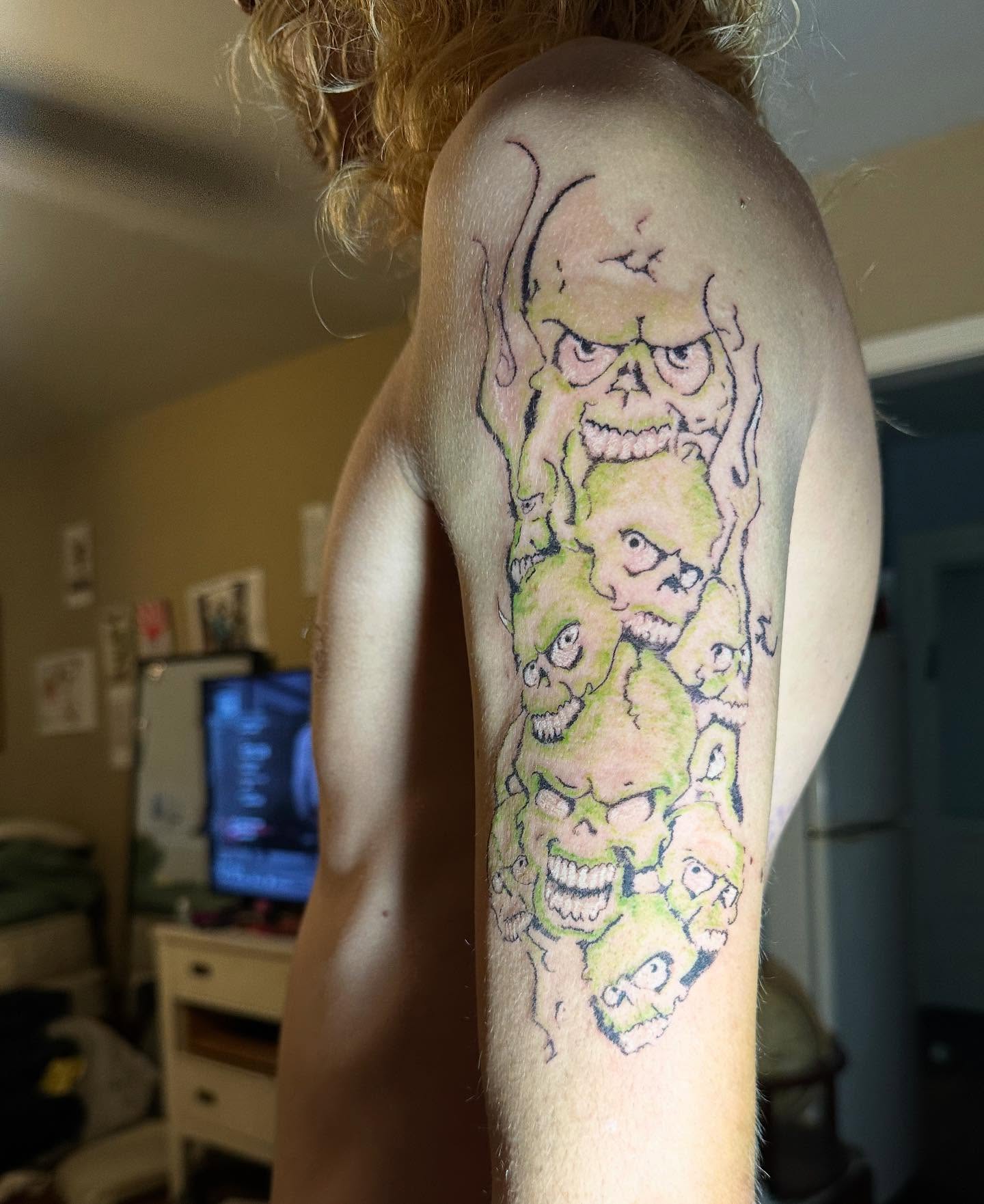Ghoul heads American traditional tattoo on the shoulder by Swag Originator