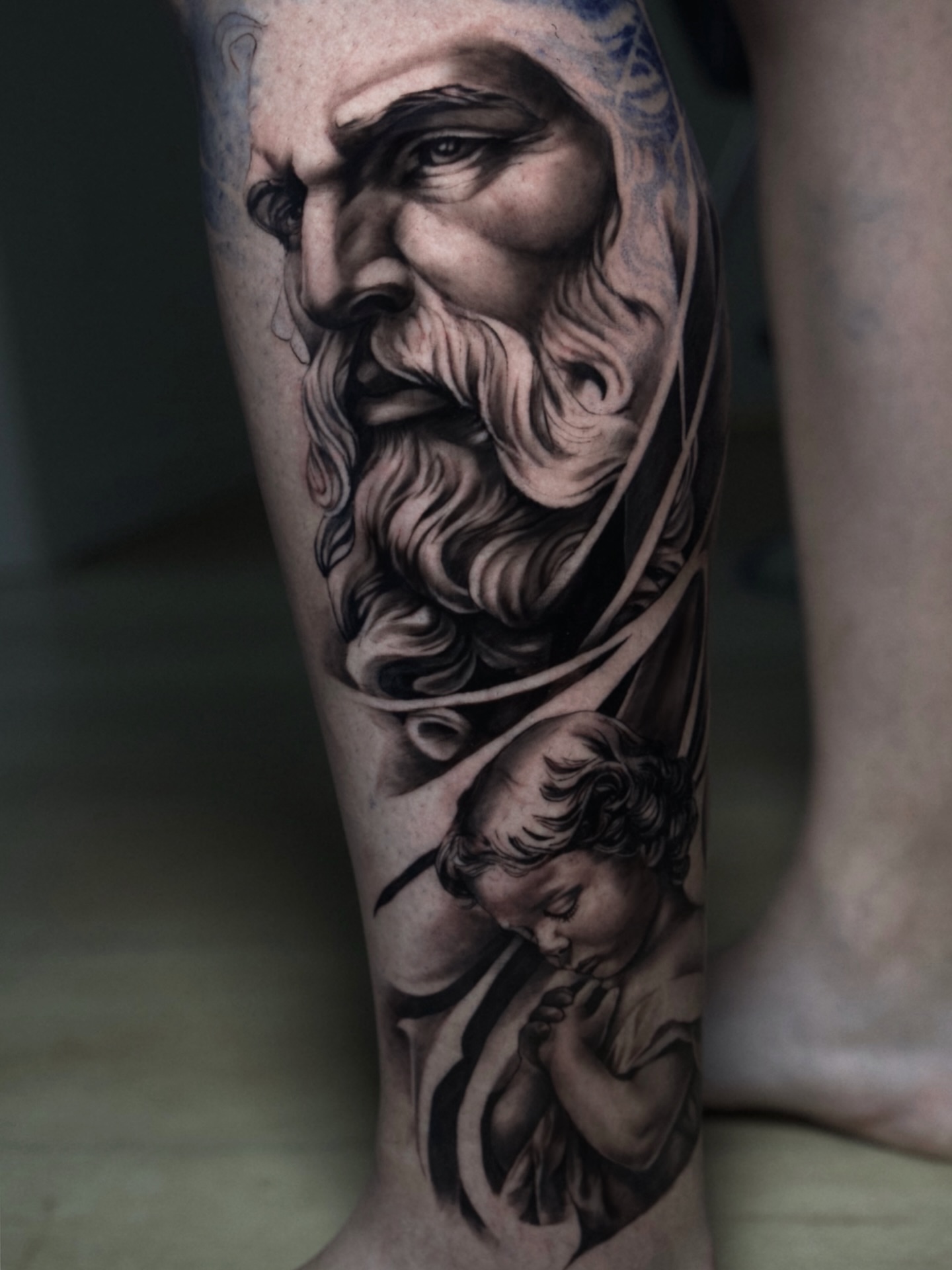 Tattoo by @tattooandres191 — realism, black_and_grey