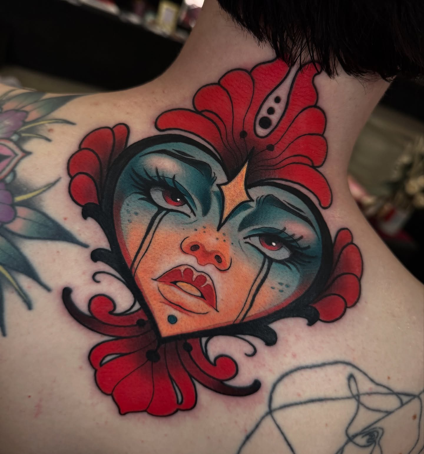 Woman's face American traditional tattoo on the neck by Freddie Brown, Lombard, IL