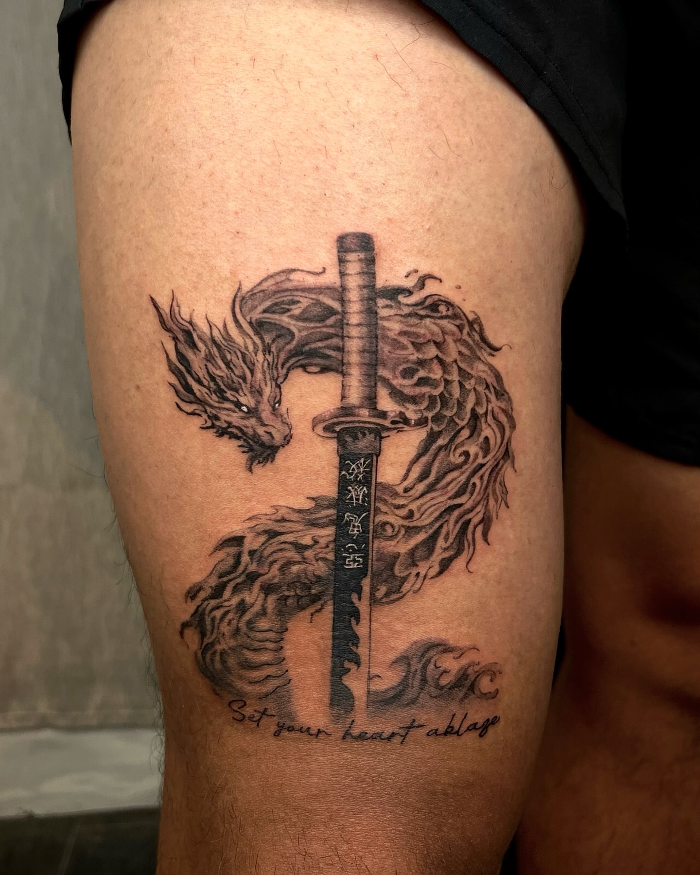 Tattoo by @kallo_tt — black_and_grey, realism