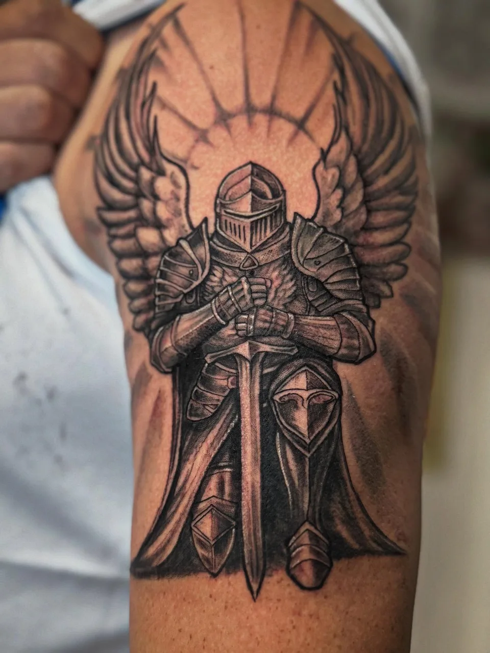 Knight with sword black and grey tattoo on the forearm by Eldaddy
