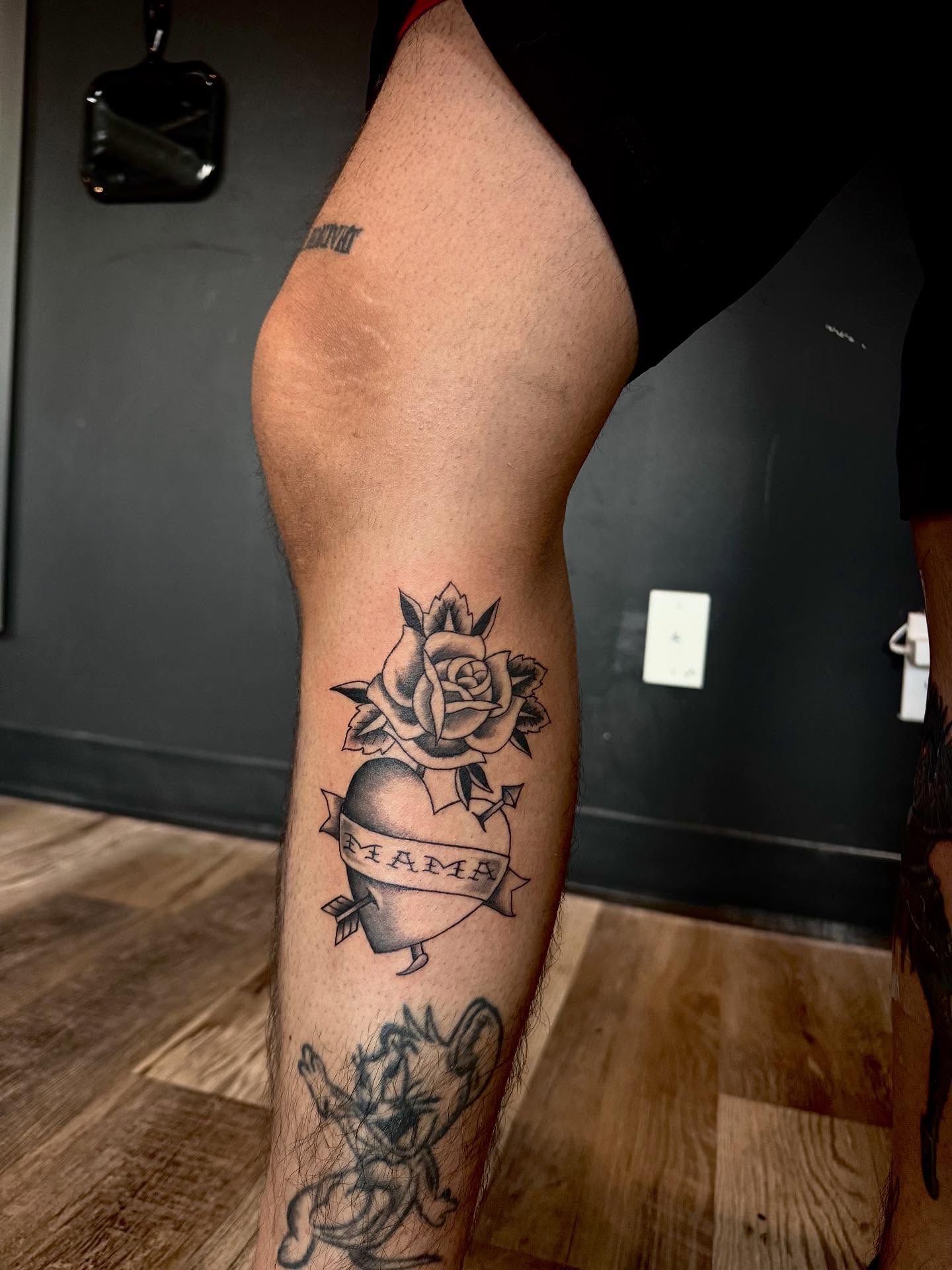 Heart with roses black and grey tattoo on the forearm by Nathalie Briseno