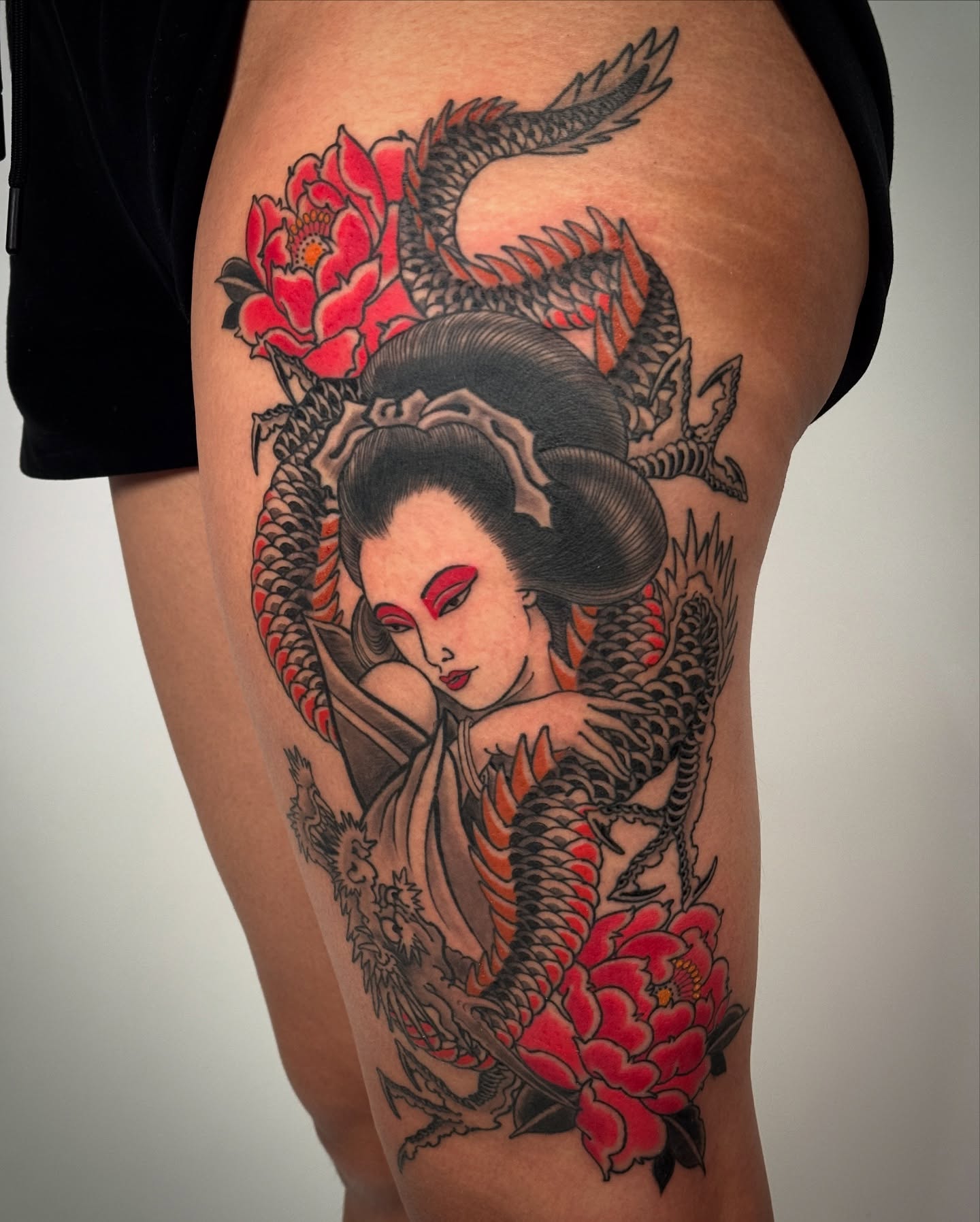 Geisha with dragon and flowers japanese irezumi tattoo on the thigh by Tattooer by Trade Wannabe Artist at Heart