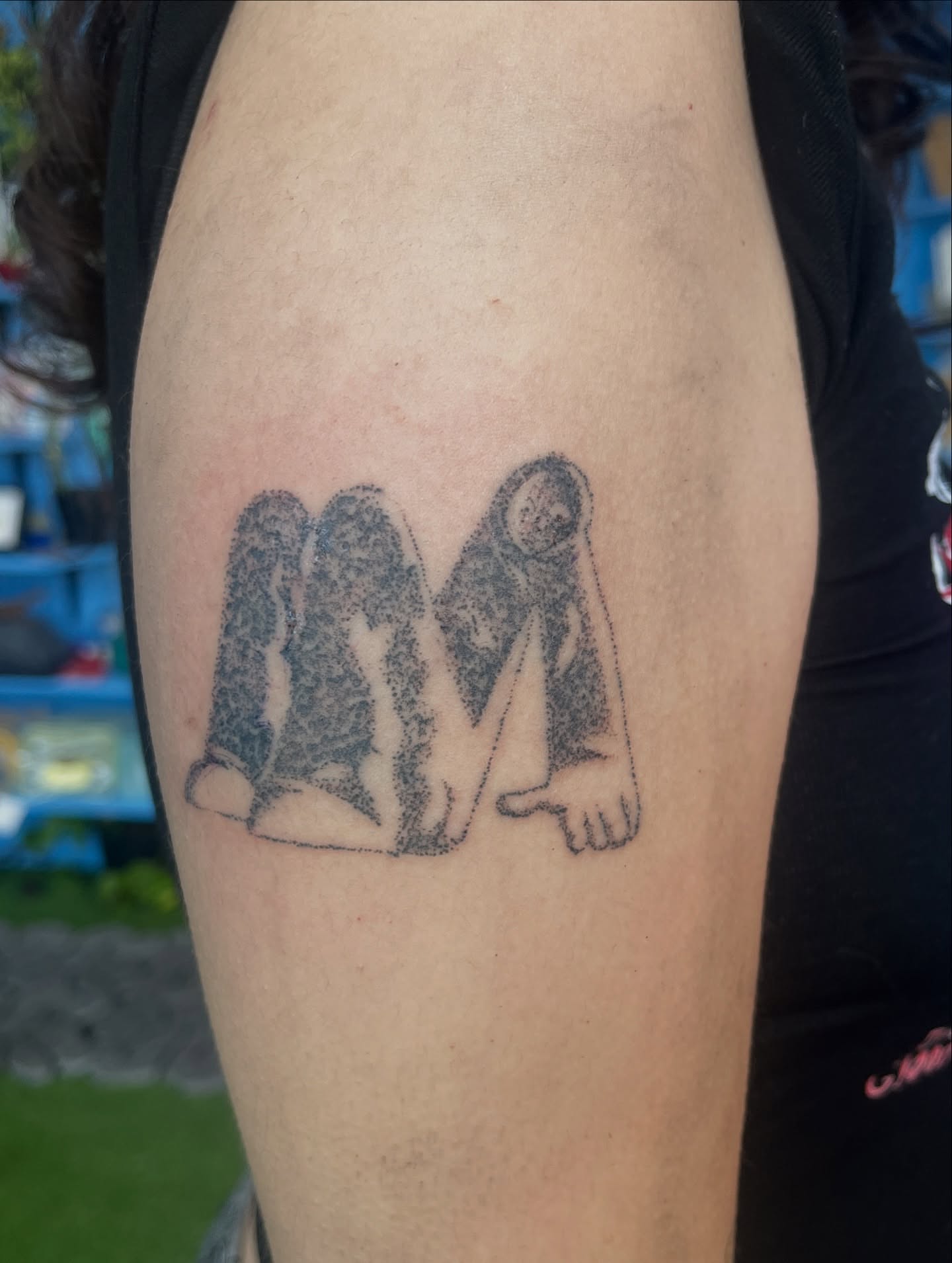 Letter 'M' dotwork tattoo on the forearm by hana