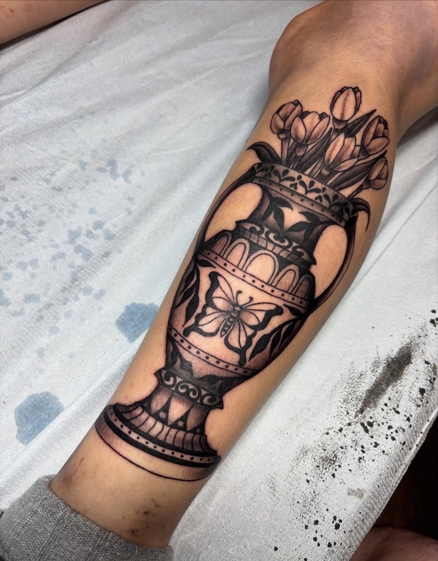 Tattoo by @arkoudatattoo — black_and_grey