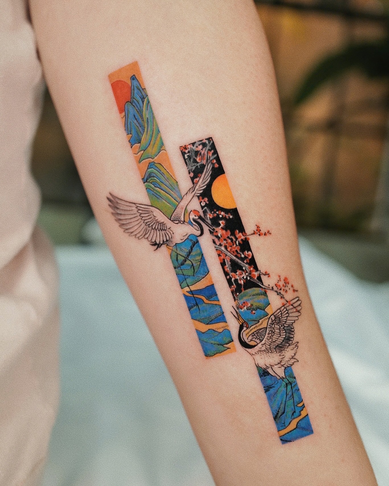 Cranes and cherry blossoms japanese irezumi tattoo on the forearm by Seattle