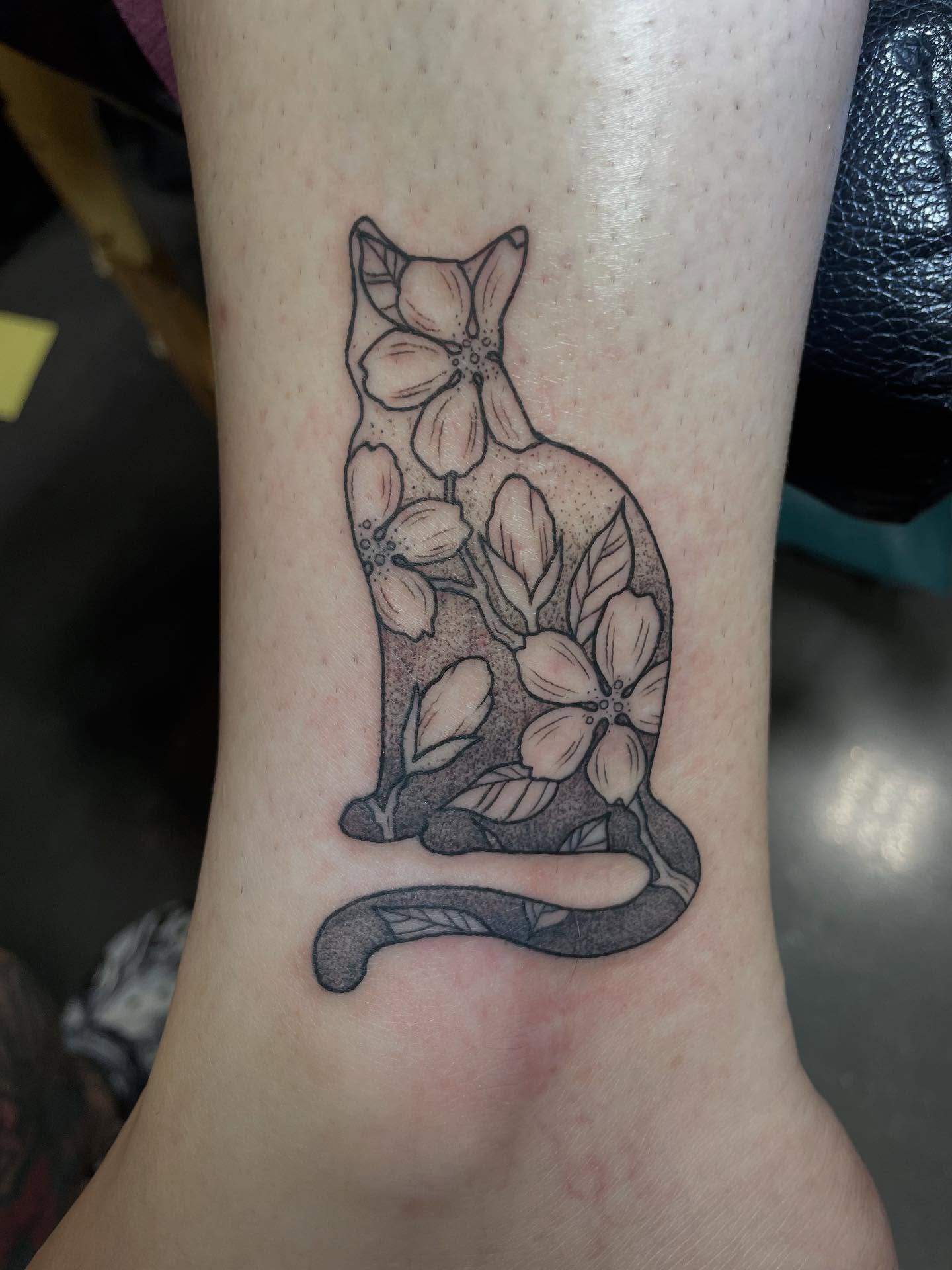 Cat and flowers black and grey tattoo on the forearm by Lake Stephens, Richmond, Virginia