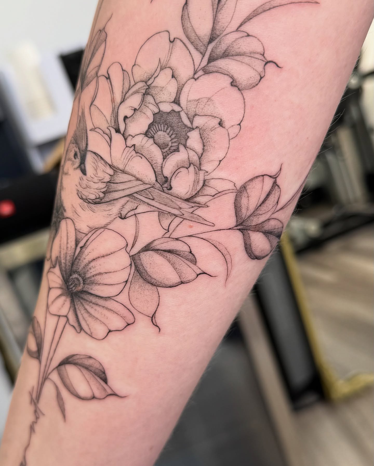 Floral arrangement realism tattoo on the forearm by Daniel Montoya, Charlotte, North Carolina