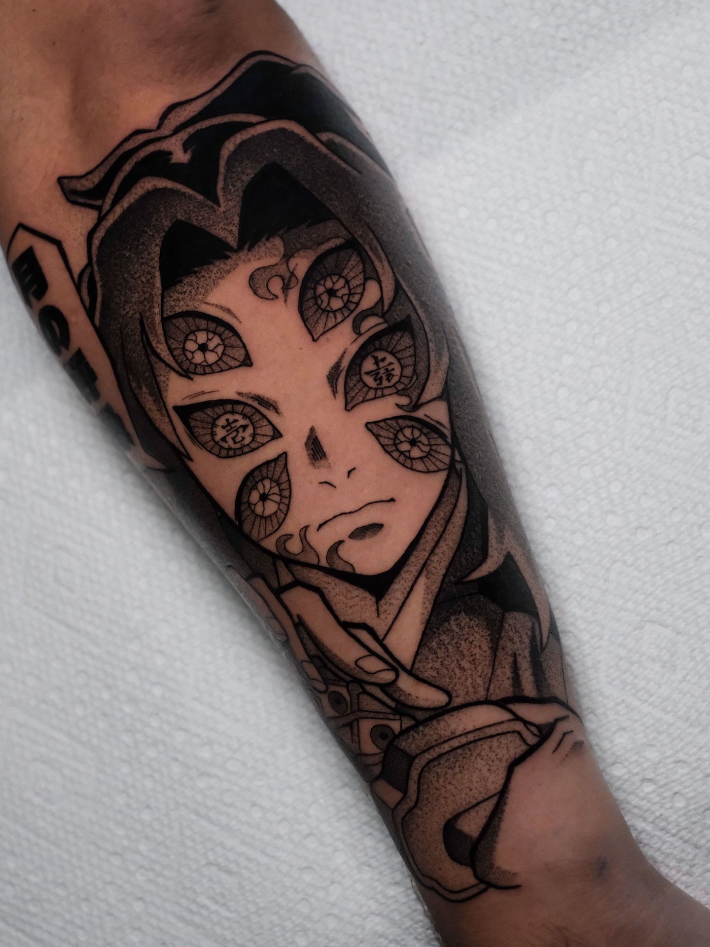 Anime character dotwork tattoo on the forearm by Yakir, Houston, Texas