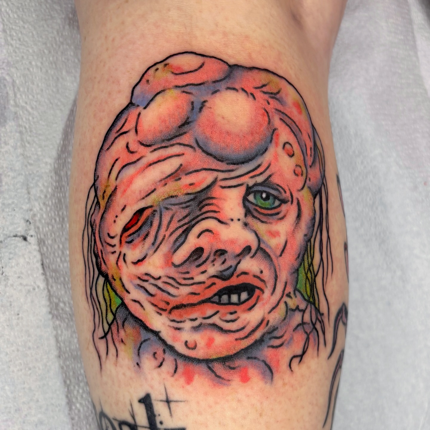 Horror creature realism tattoo on the forearm by Randy Conner, Portland, Oregon
