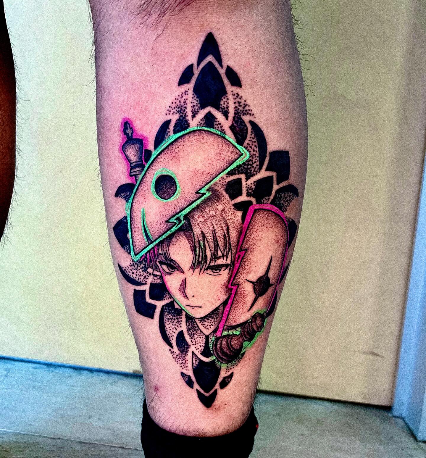 Anime character dotwork tattoo on the calf by Ashley Fino, Las Vegas, Nevada