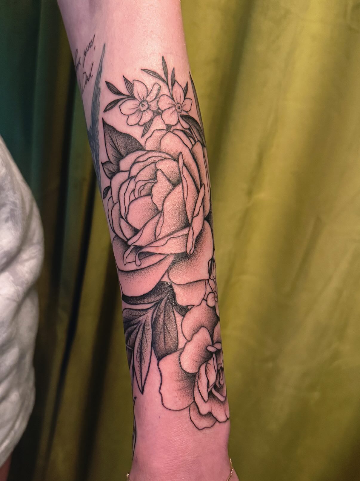 Floral bouquet dotwork tattoo on the forearm by π½πππππ π½πππππππ, New Orleans, Louisiana