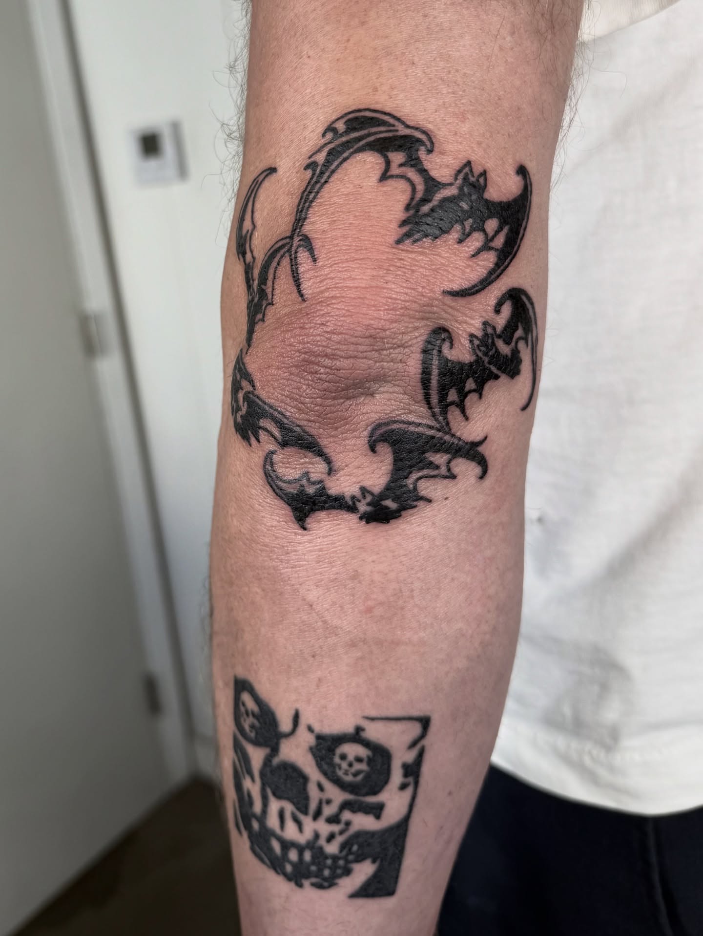 Bat black and grey tattoo on the forearm by Han shinko, Portland, Oregon