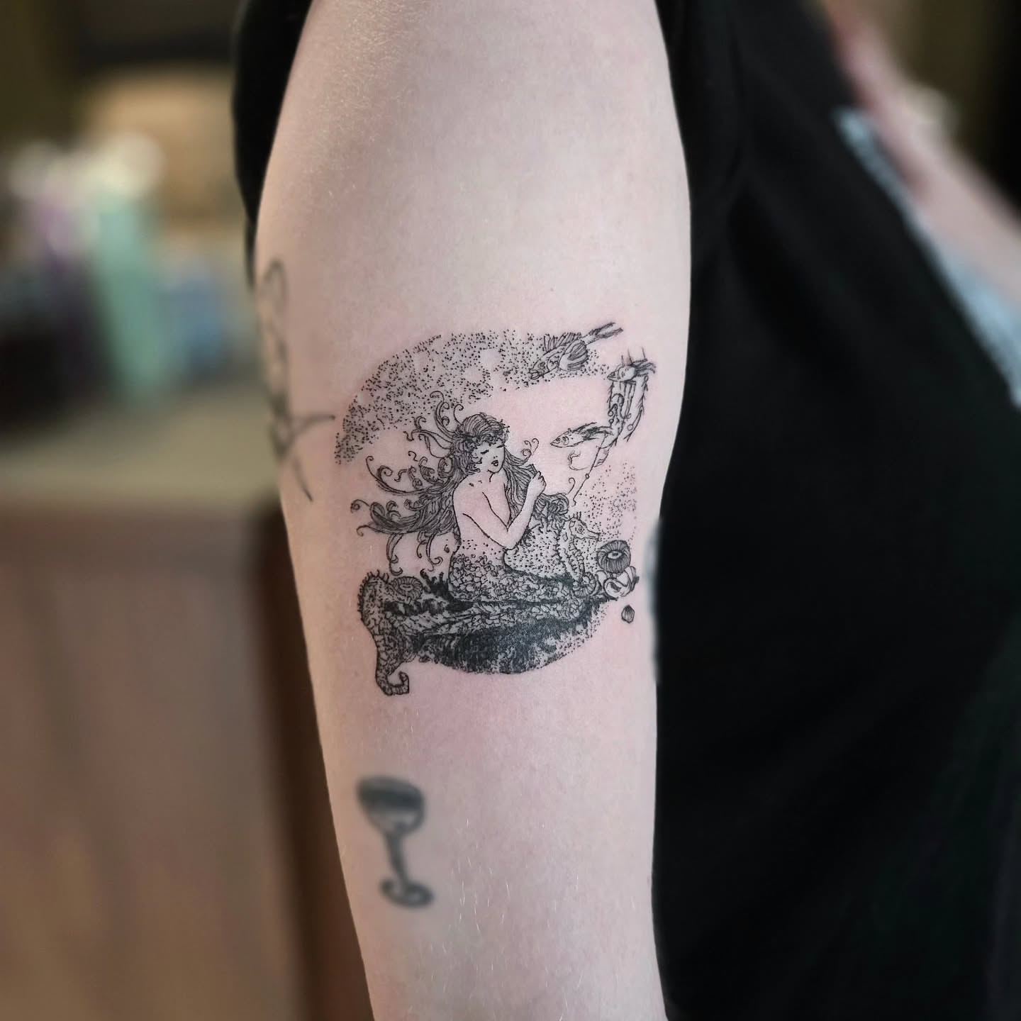 Mermaid dotwork tattoo on the forearm by Vintage tattoo