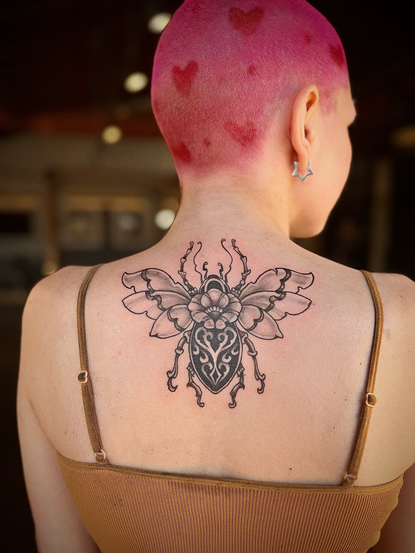 Beetle black and grey tattoo on the back by Jewels, St. George, Utah