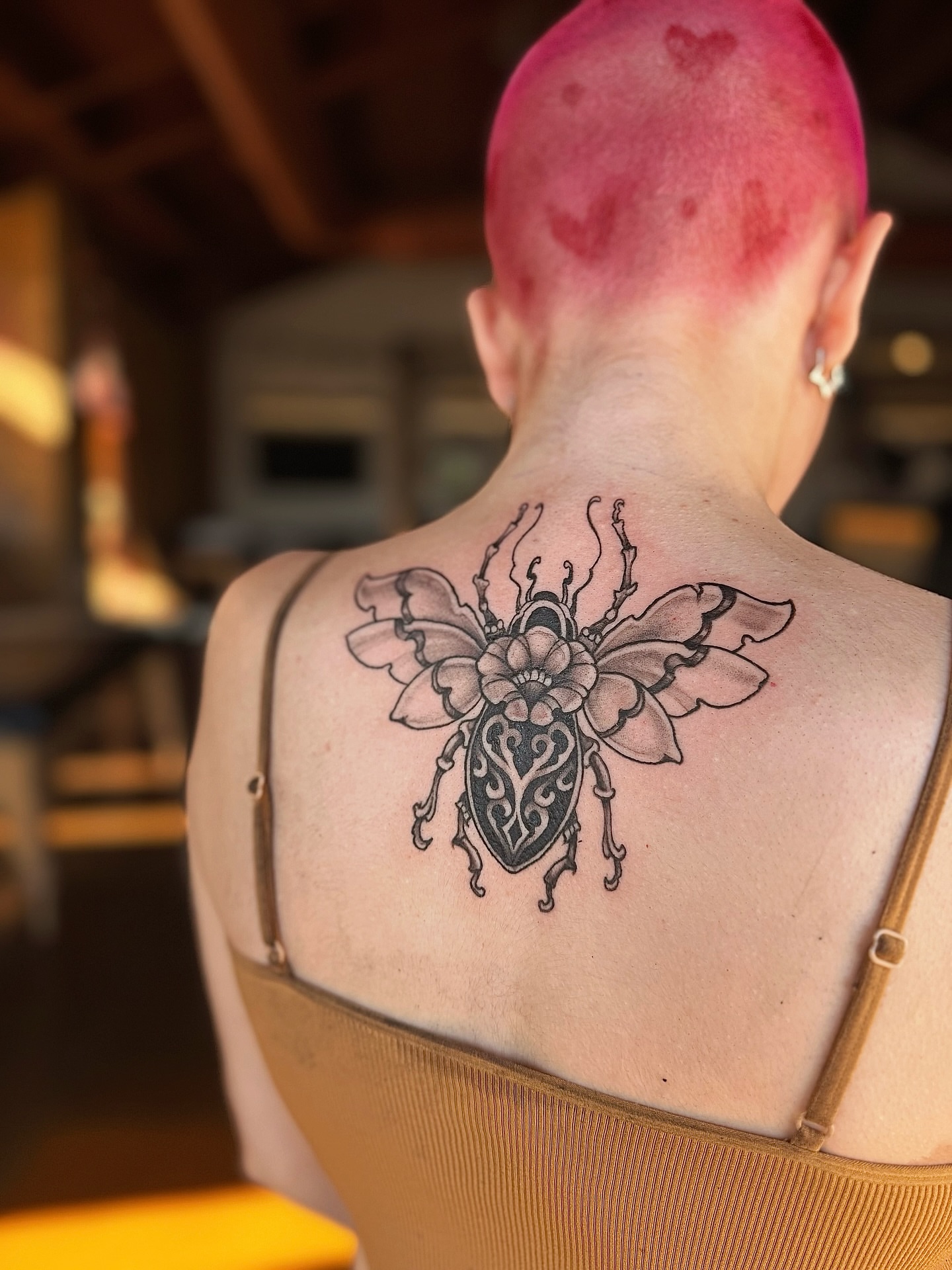 Beetle black and grey tattoo on the back by Jewels, St. George, Utah