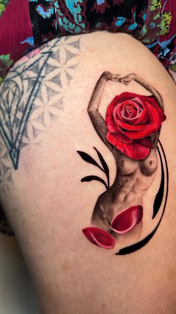 Woman with rose head realism tattoo by Tori Bent