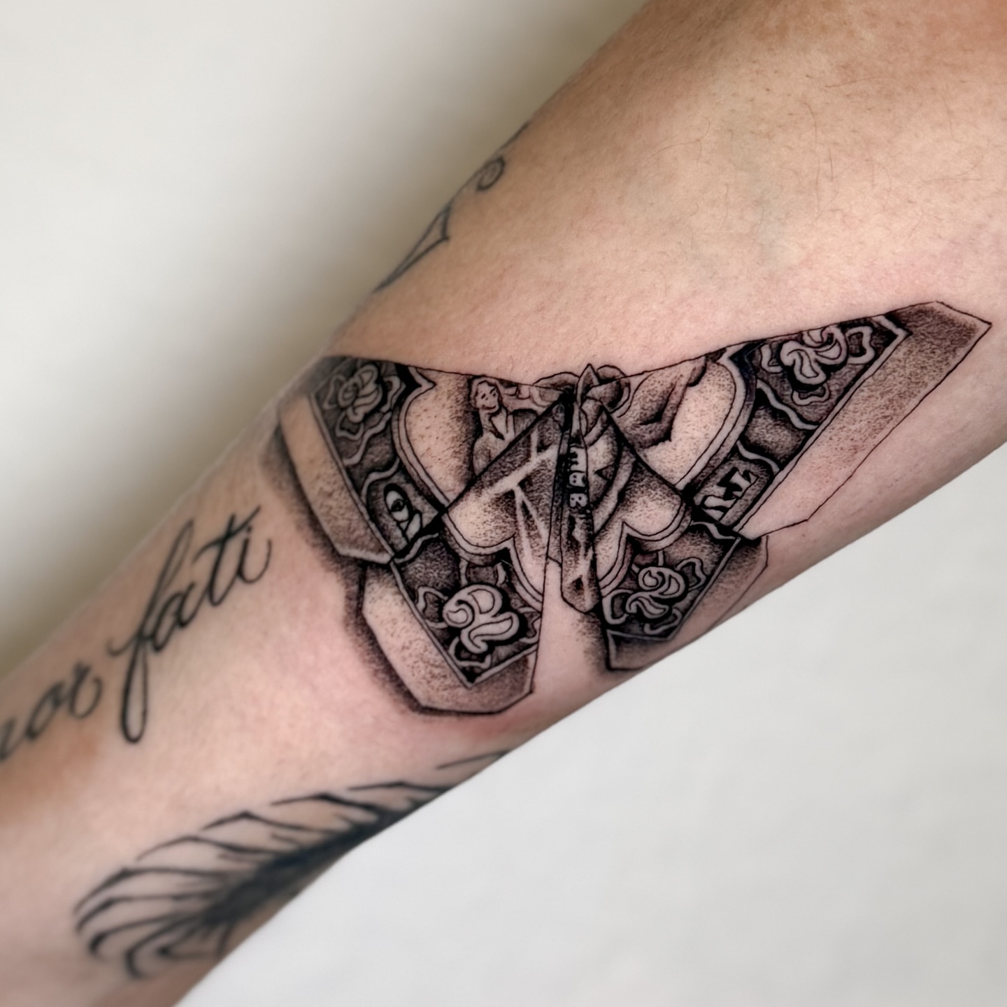 Angelic figure dotwork tattoo on the forearm by @sadfoo_tattoo, Austin, Texas