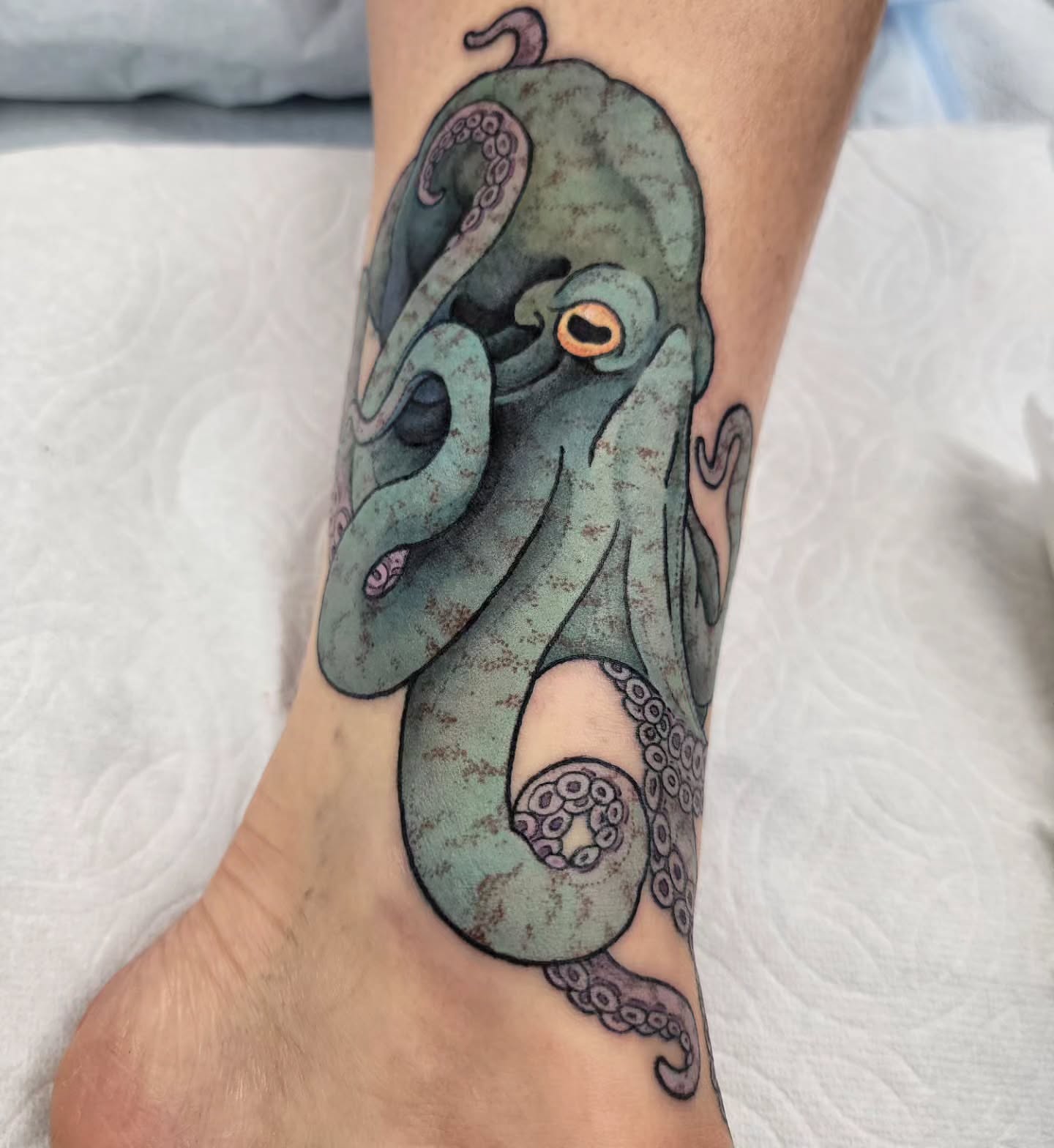 Octopus realism tattoo on the foot by Chantel Chan, Portland, Oregon
