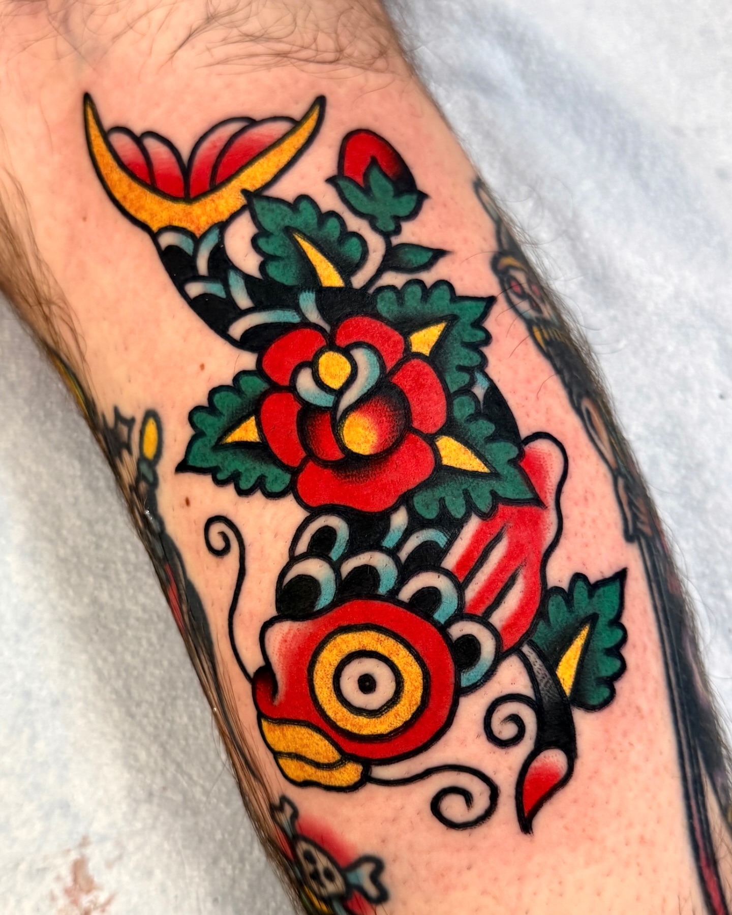Koi fish American traditional tattoo on the forearm by Cullen Bleser Quinn