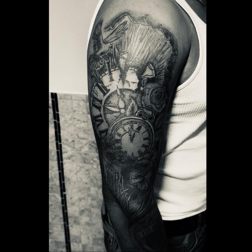 Clock and floral realism tattoo on the forearm by Ink’d by Reina 🖤, Colorado Springs, Colorado