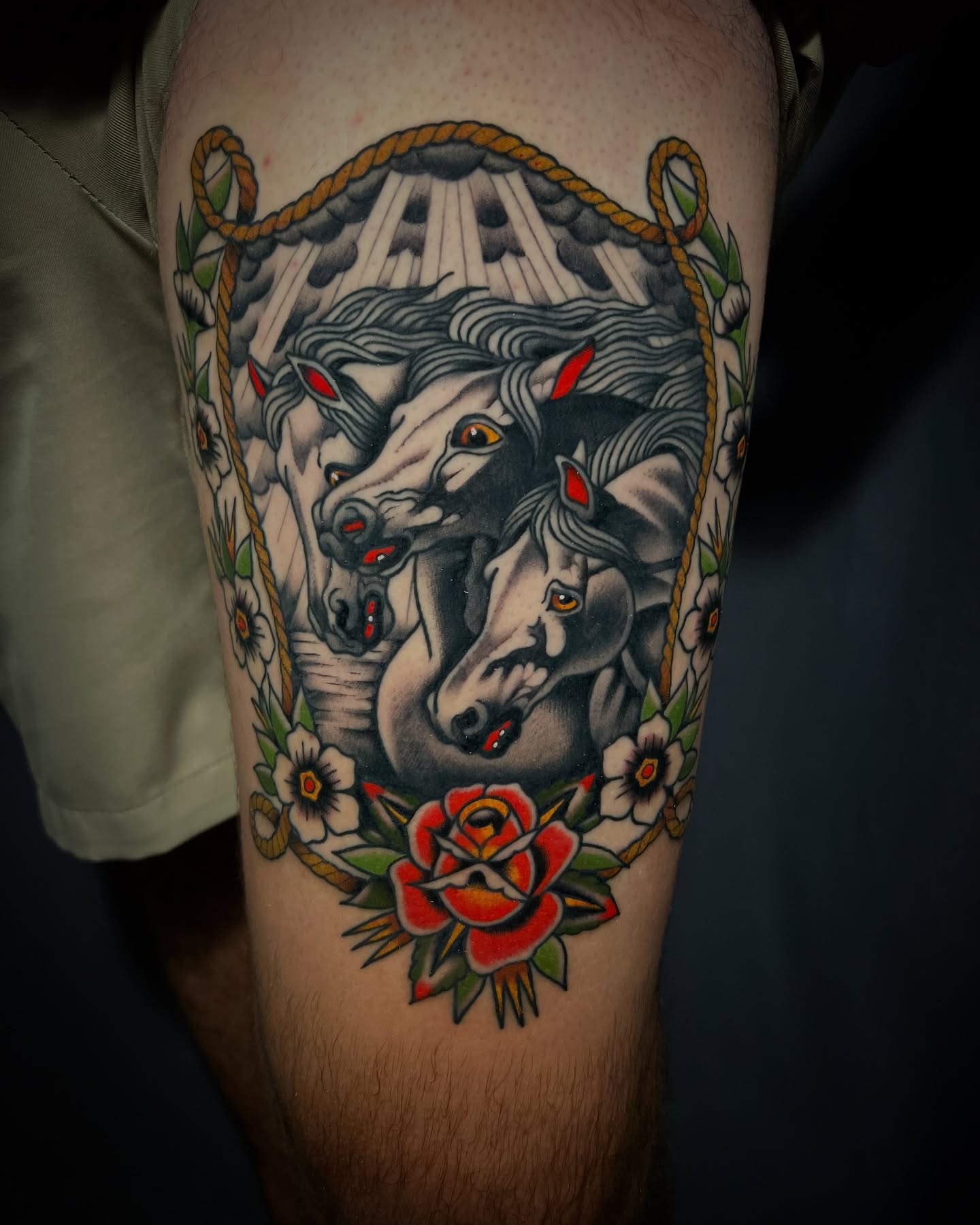 Three horses American traditional tattoo on the thigh by Michael Munter, Philadelphia, Pennsylvania