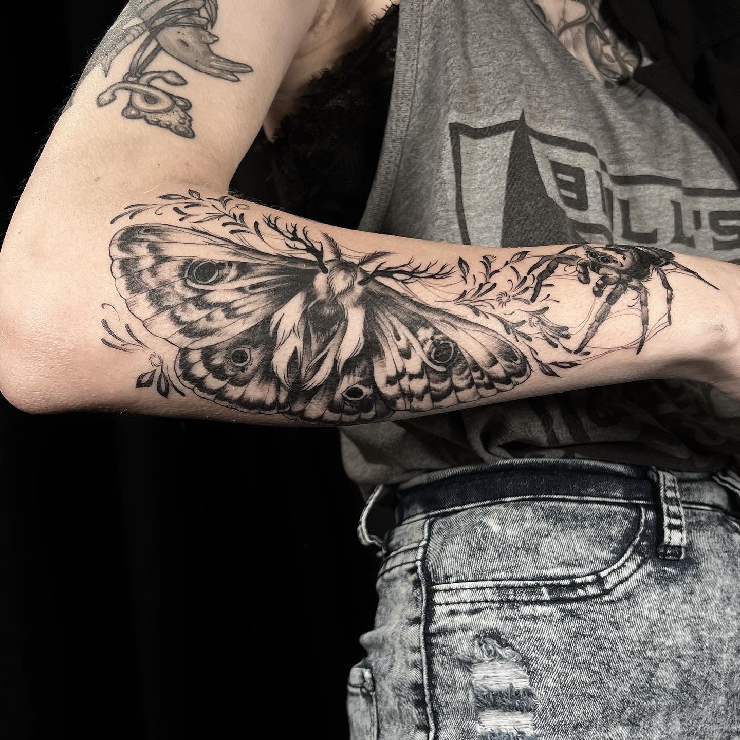 Moth and spider realism tattoo on the forearm by ༒ boniandi༒