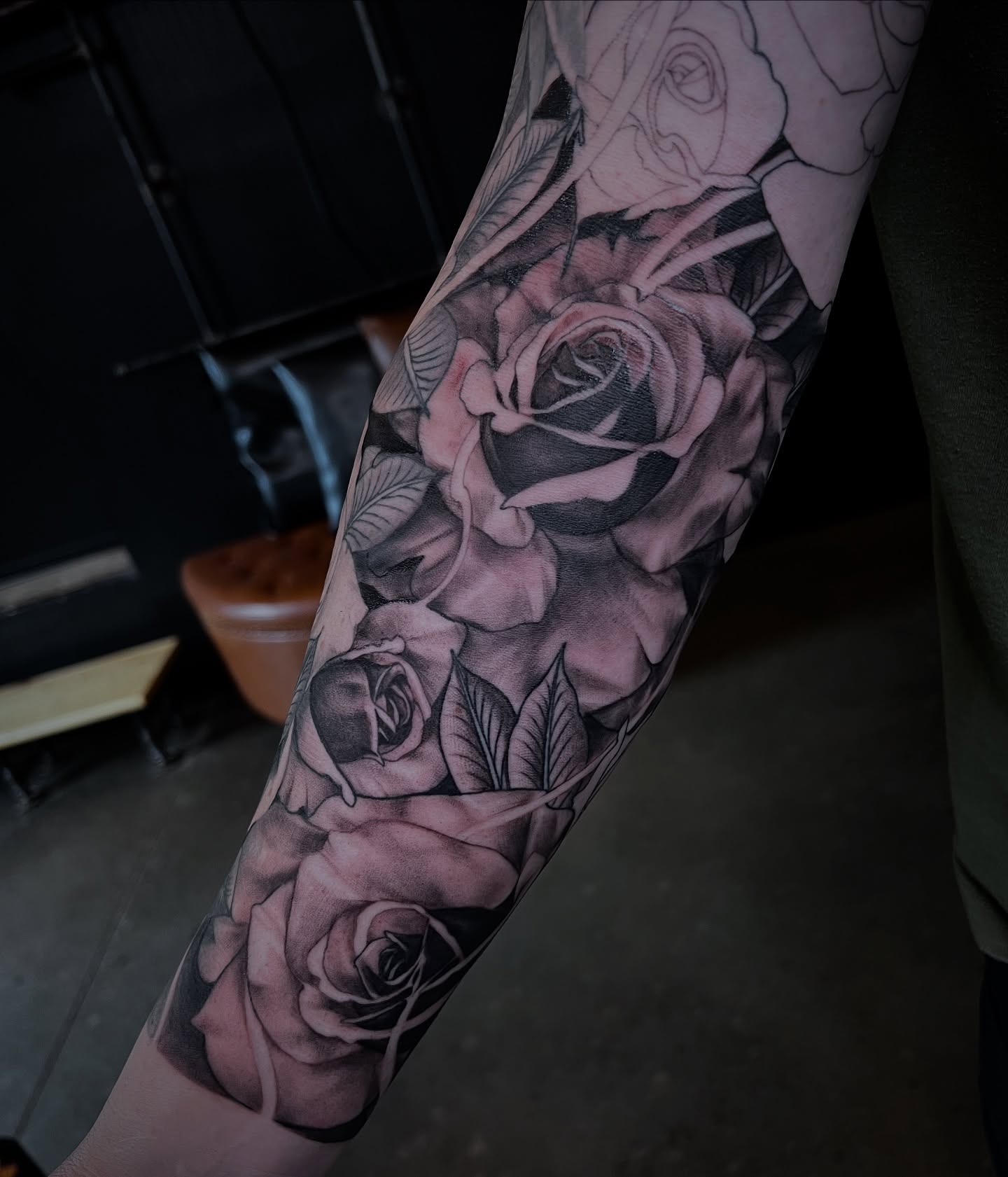 Roses black and grey tattoo on the forearm by Amanda Leitch