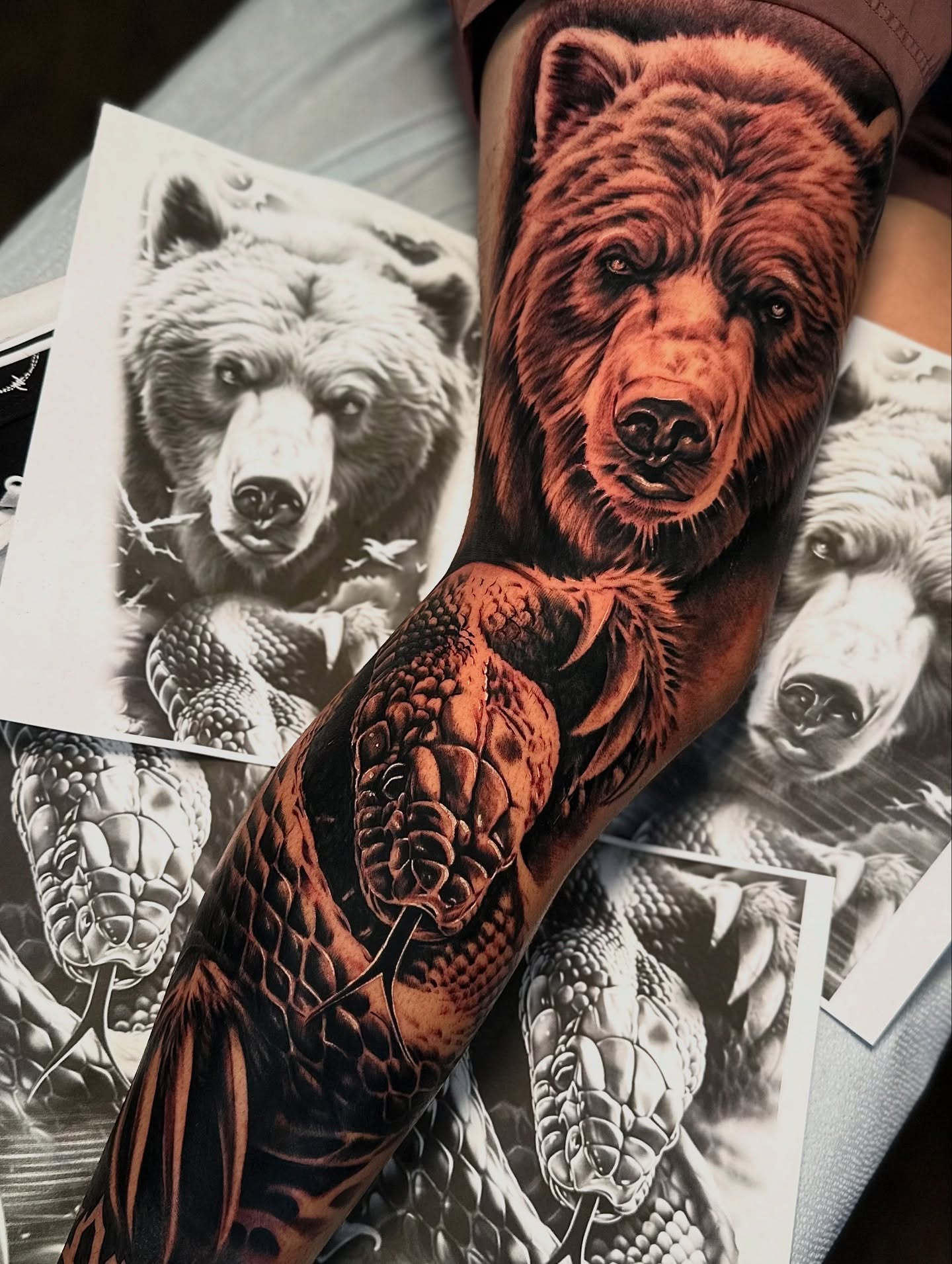 Bear realism tattoo on the forearm by Ray Ochoa