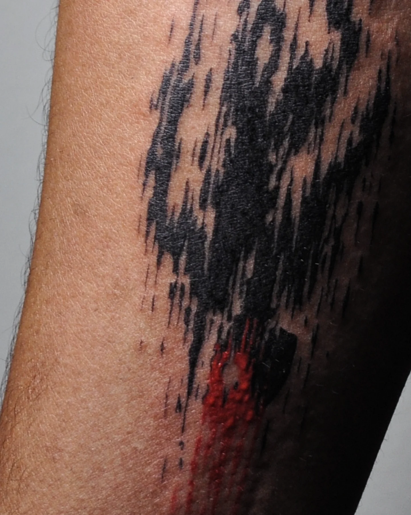 Abstract pattern black and grey tattoo on the forearm by Bek Artz