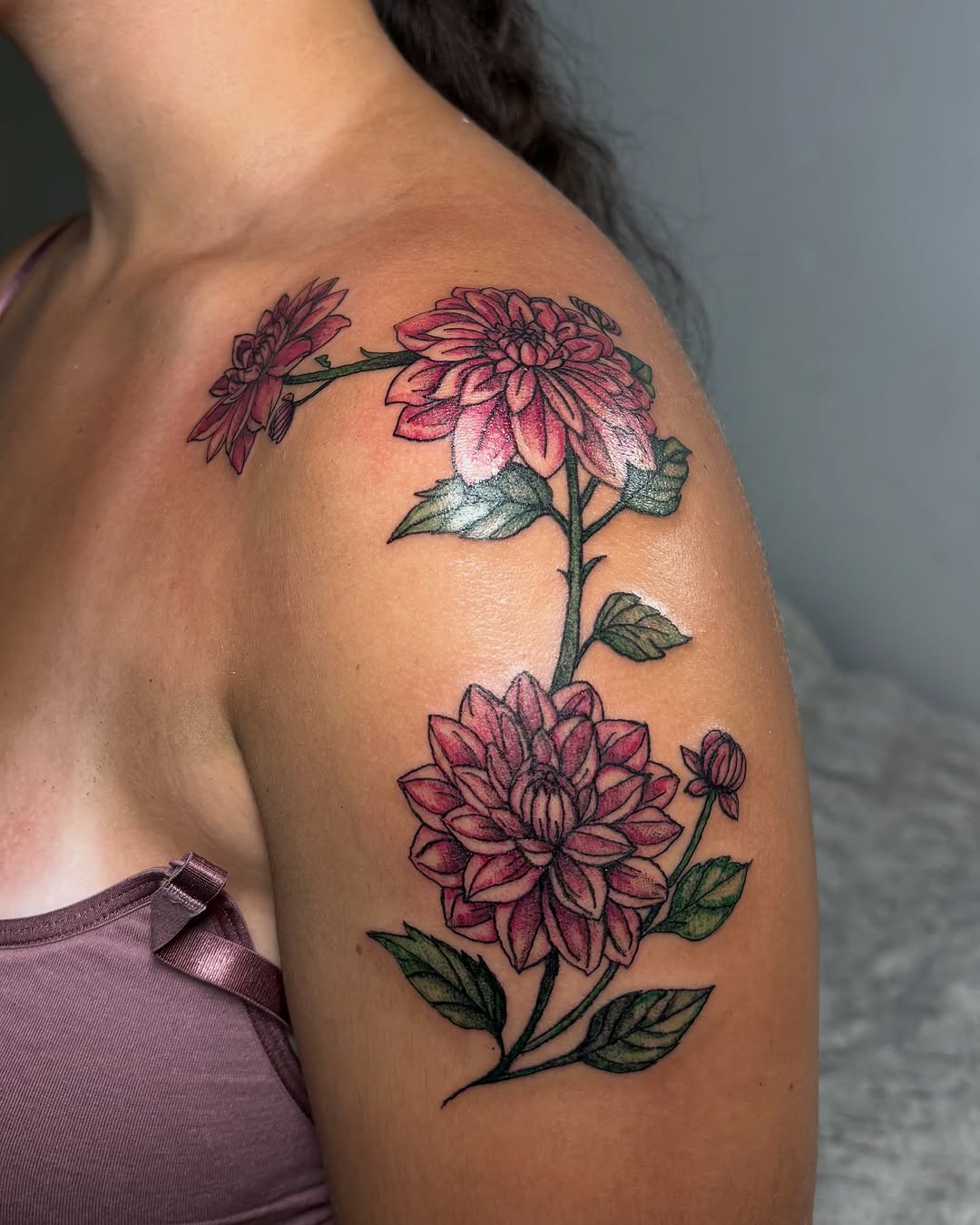 Dahlia flowers neo-traditional tattoo on the shoulder by Victoria