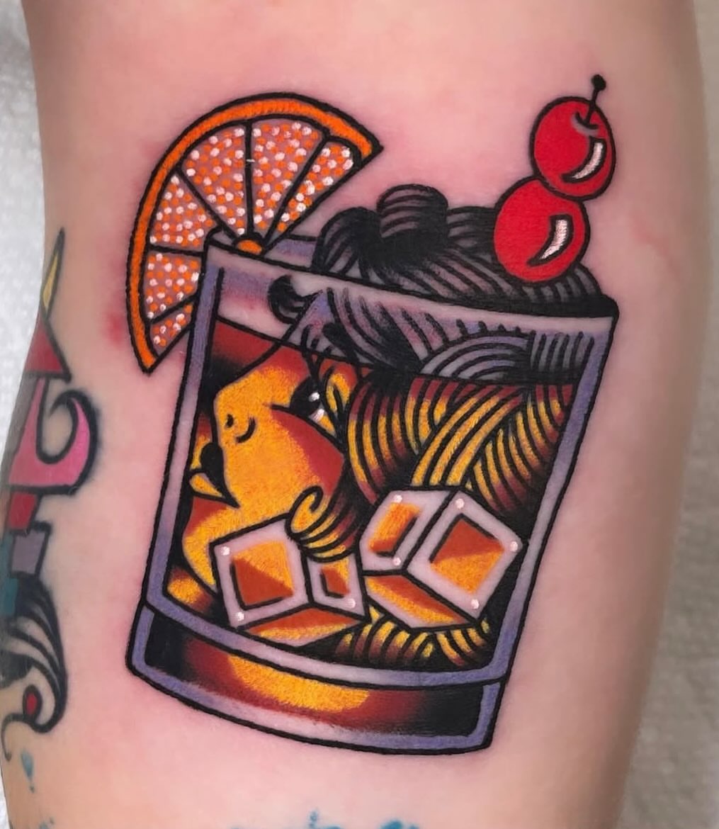 Whiskey drink American traditional tattoo on the forearm by Ryan McDonald